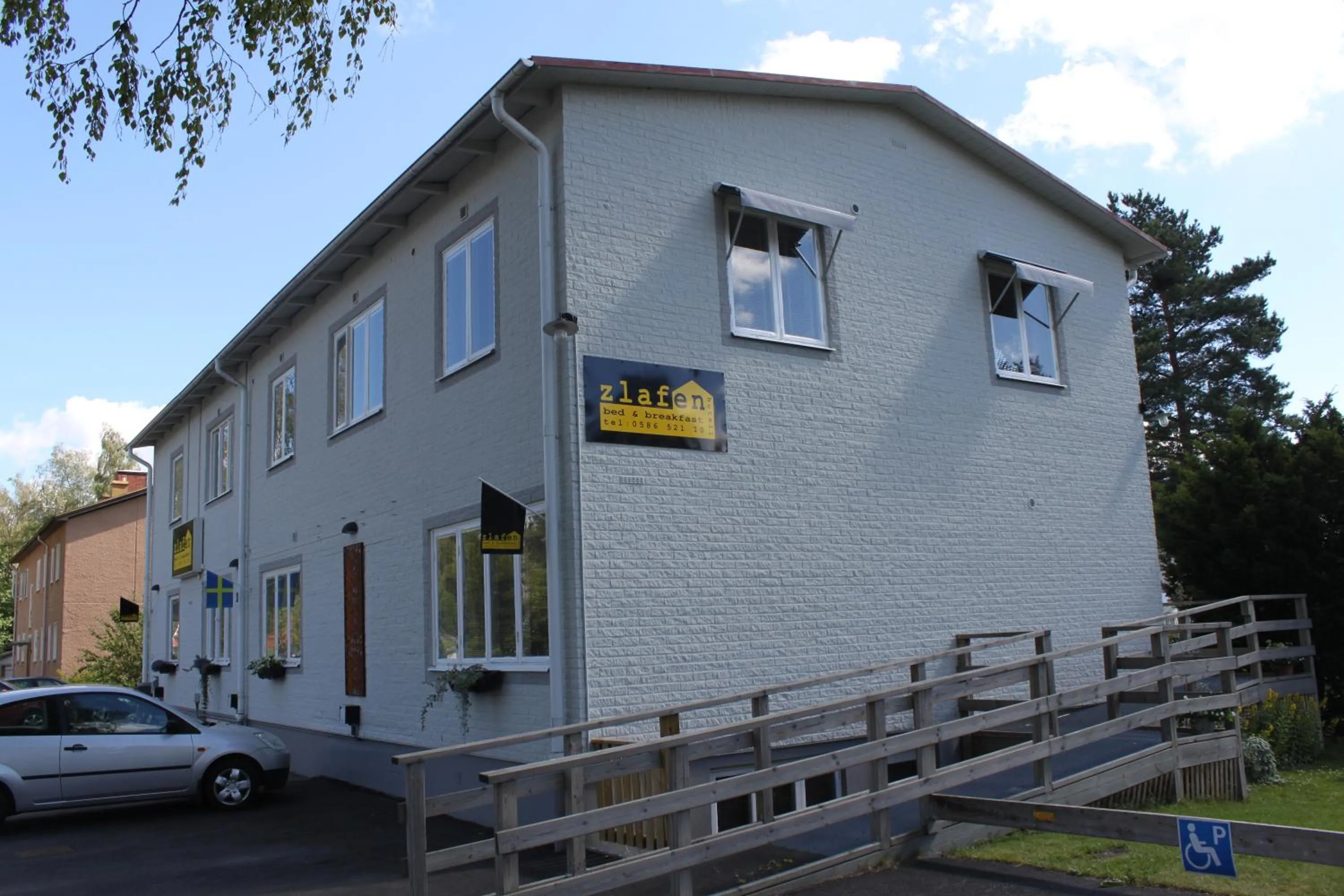 Property logo or sign in Hotell Zlafen Bed and Breakfast