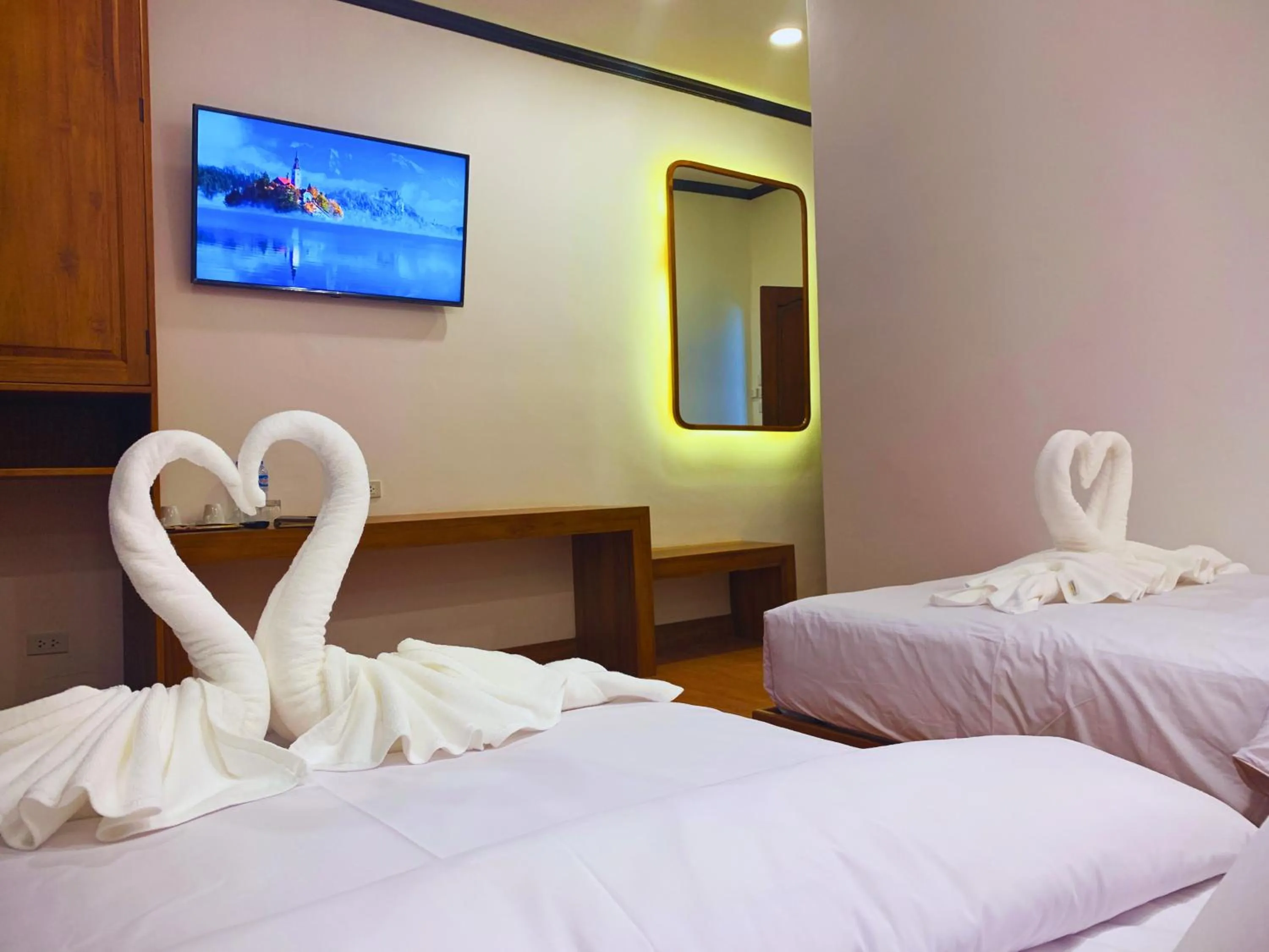 Bed in Oudomsin VangVieng Hotel