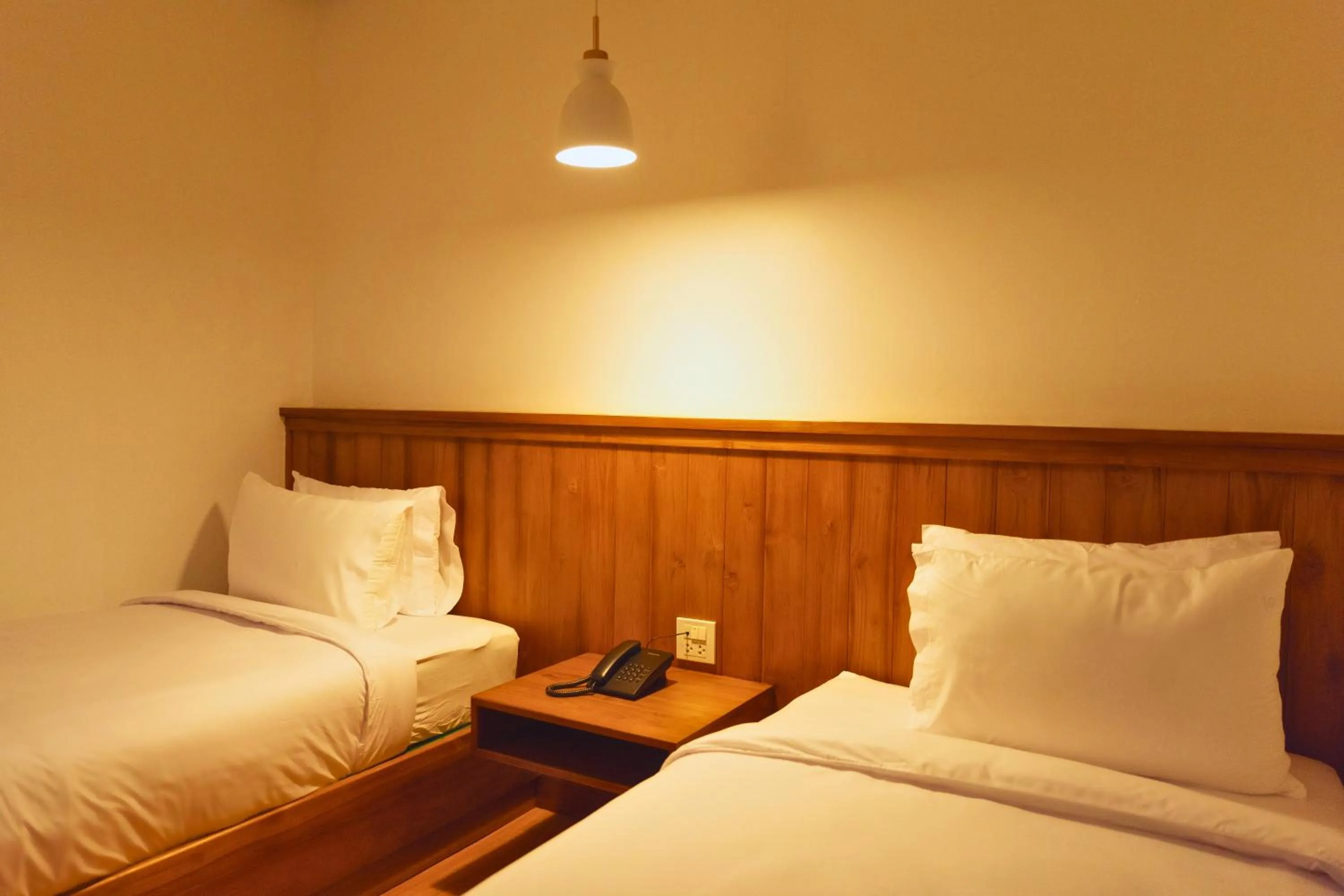 Bed in Oudomsin VangVieng Hotel