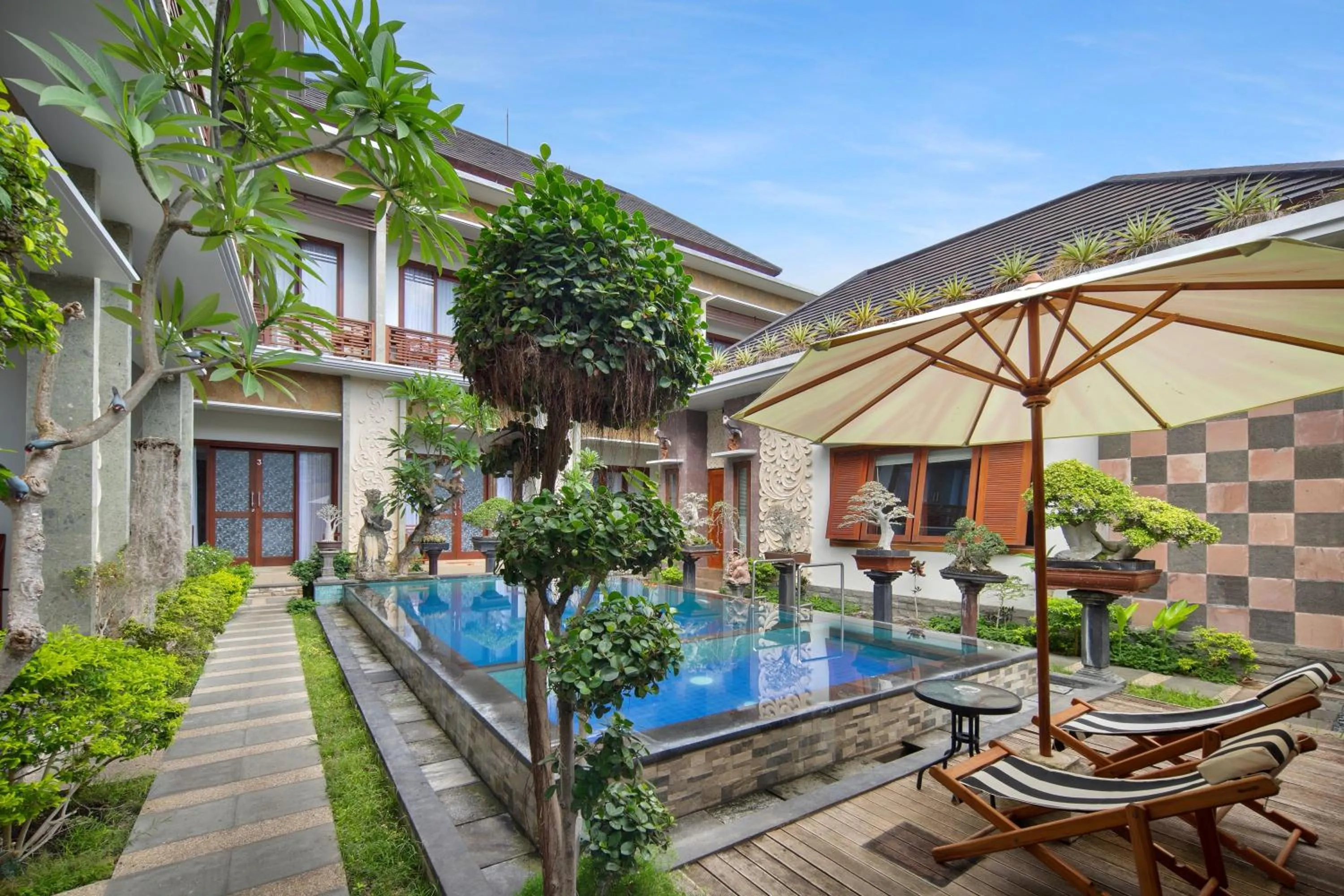 Swimming pool in Jineswari Kuta by Kamara