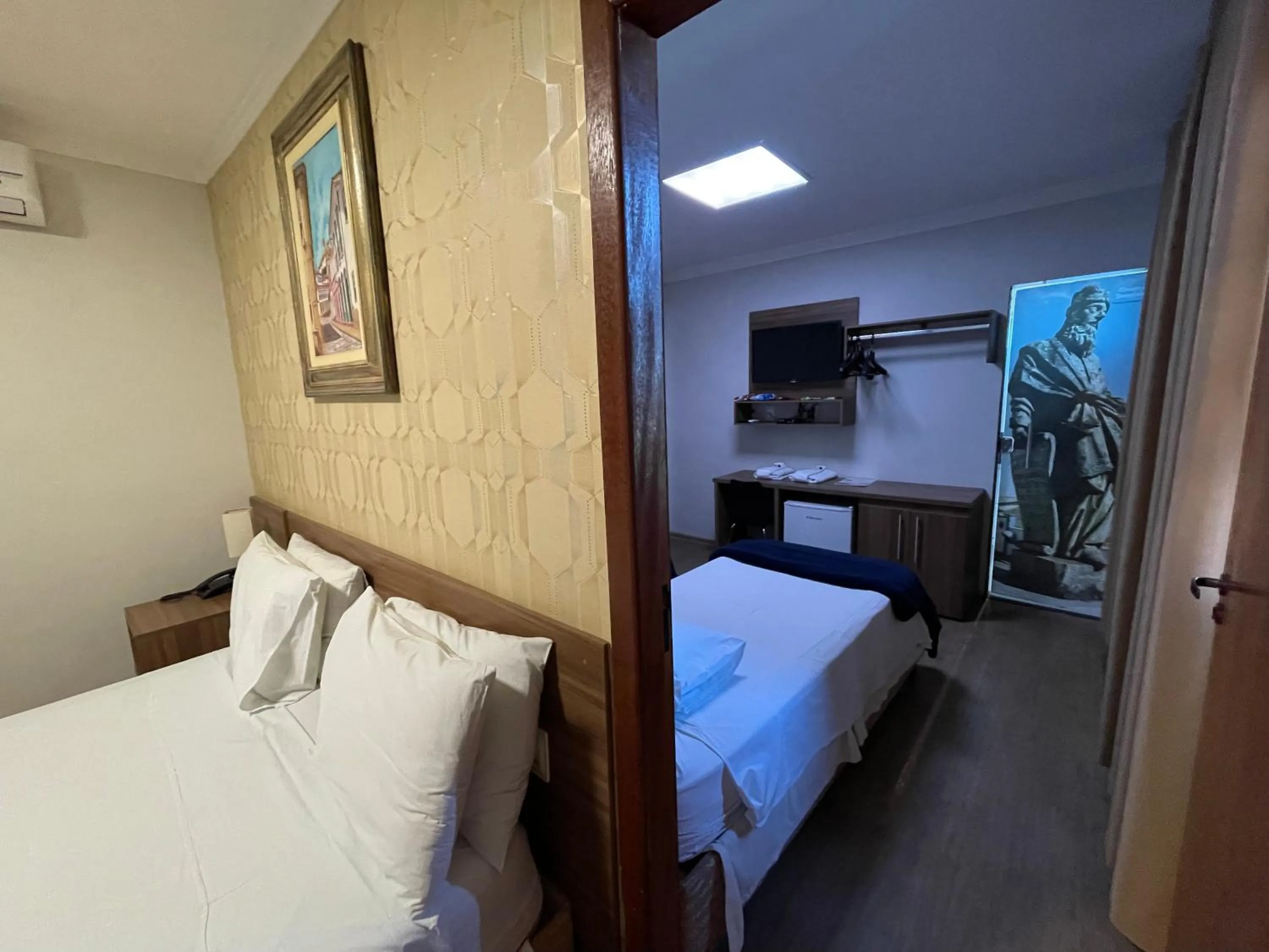 Bed in Pousada Circuito dos Inconfidentes