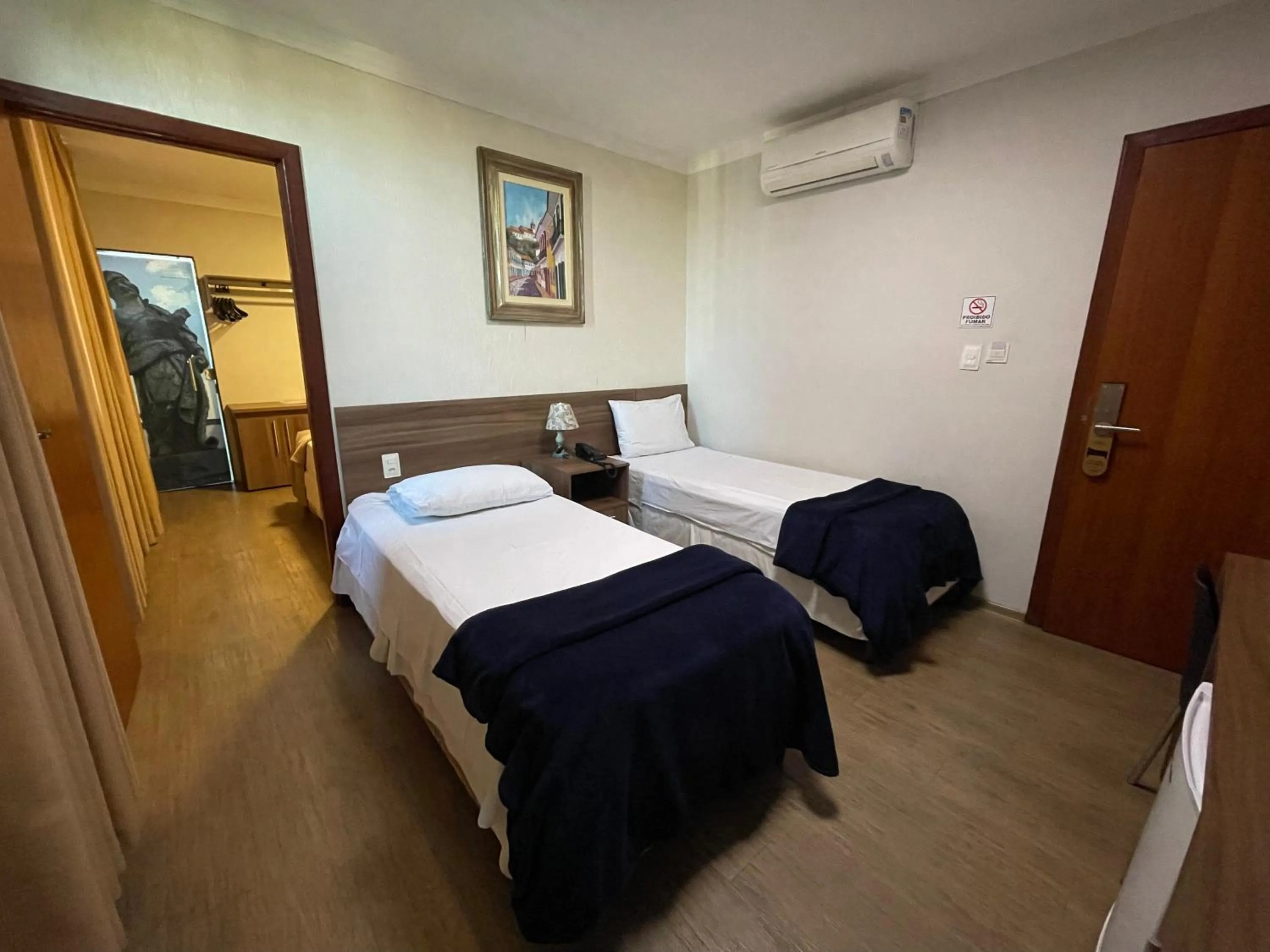 Bed in Pousada Circuito dos Inconfidentes