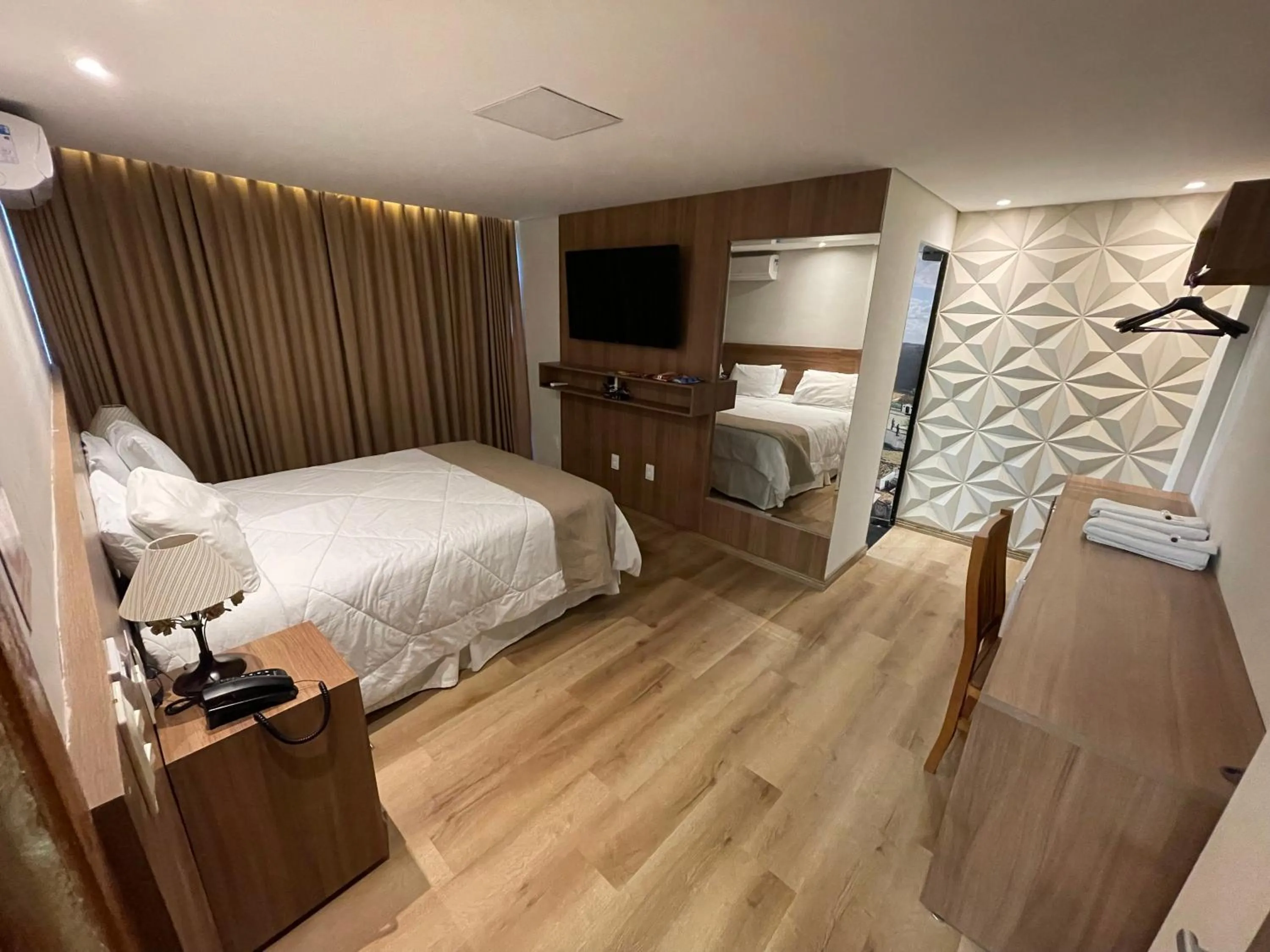 Bed in Pousada Circuito dos Inconfidentes