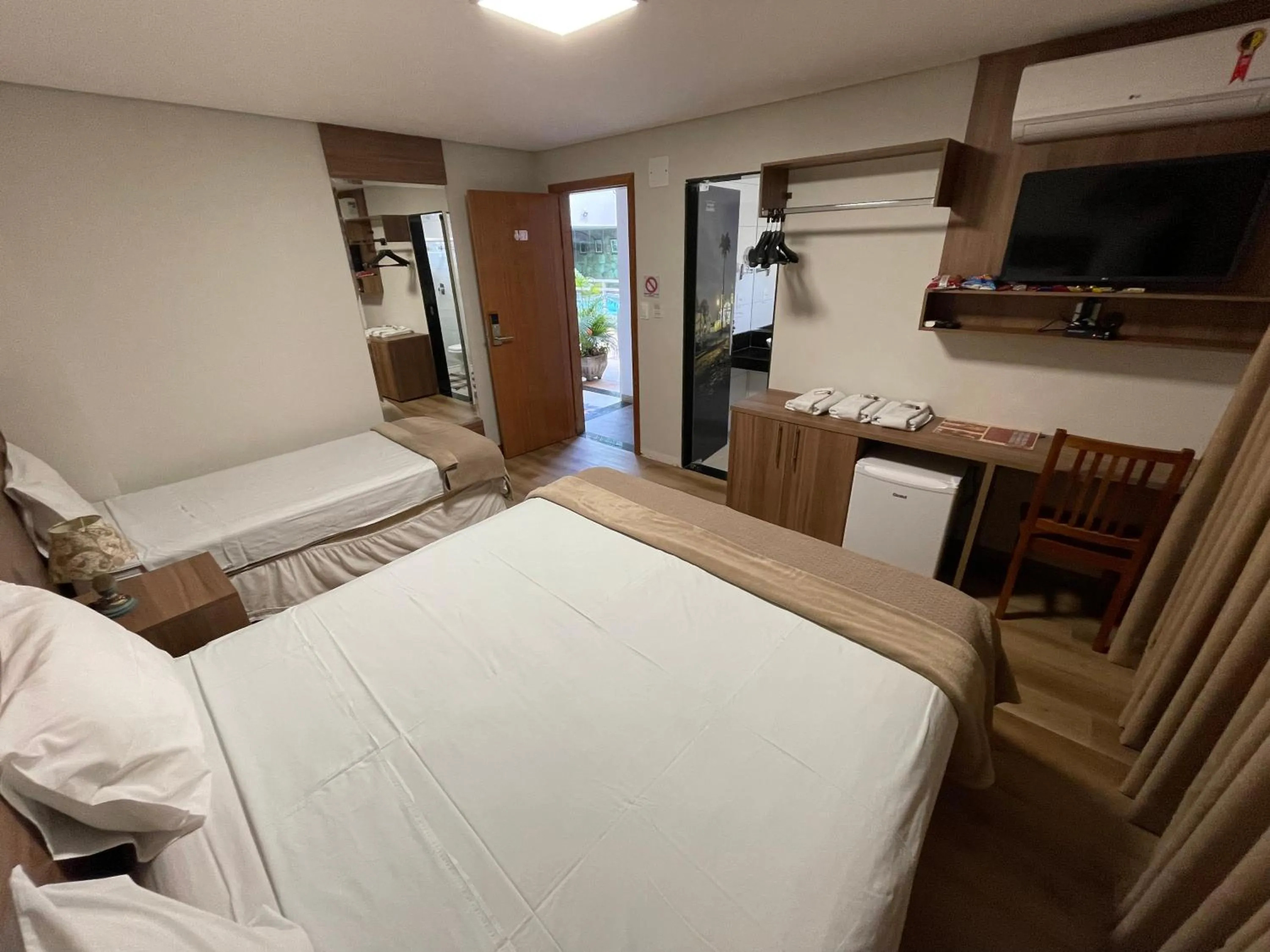 Bed in Pousada Circuito dos Inconfidentes