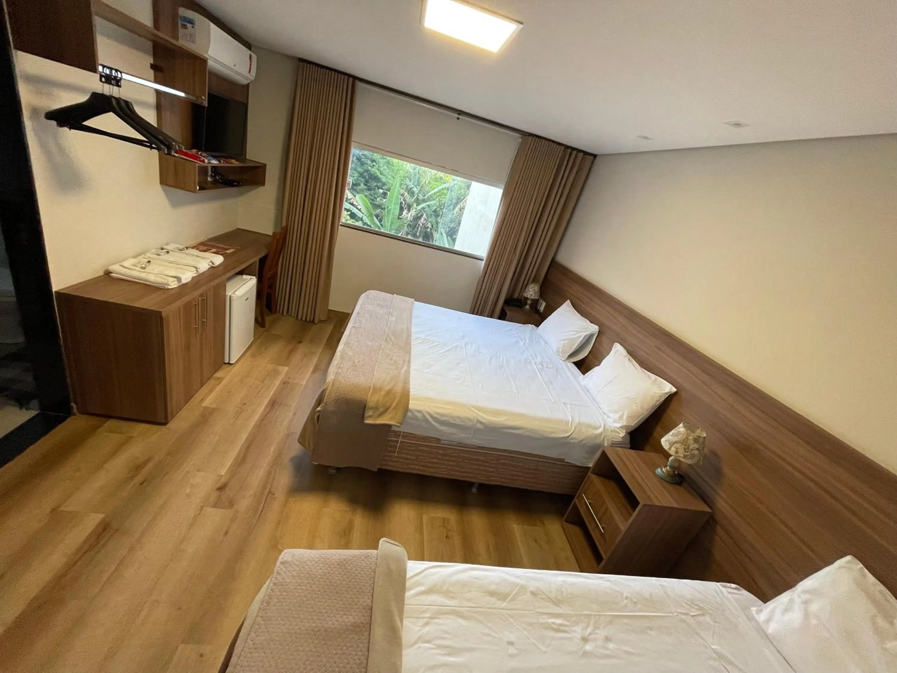 Bed in Pousada Circuito dos Inconfidentes