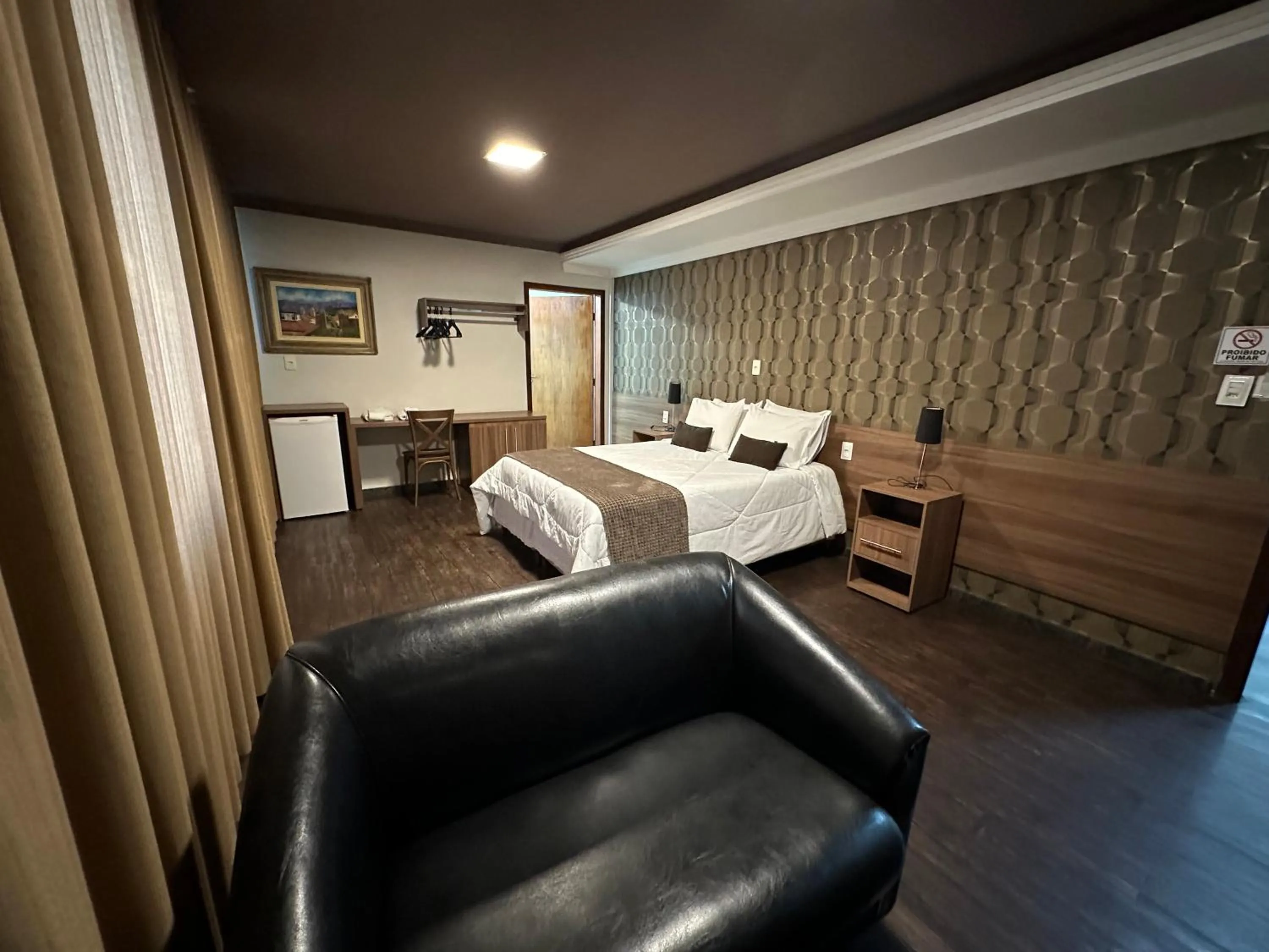 Bed in Pousada Circuito dos Inconfidentes