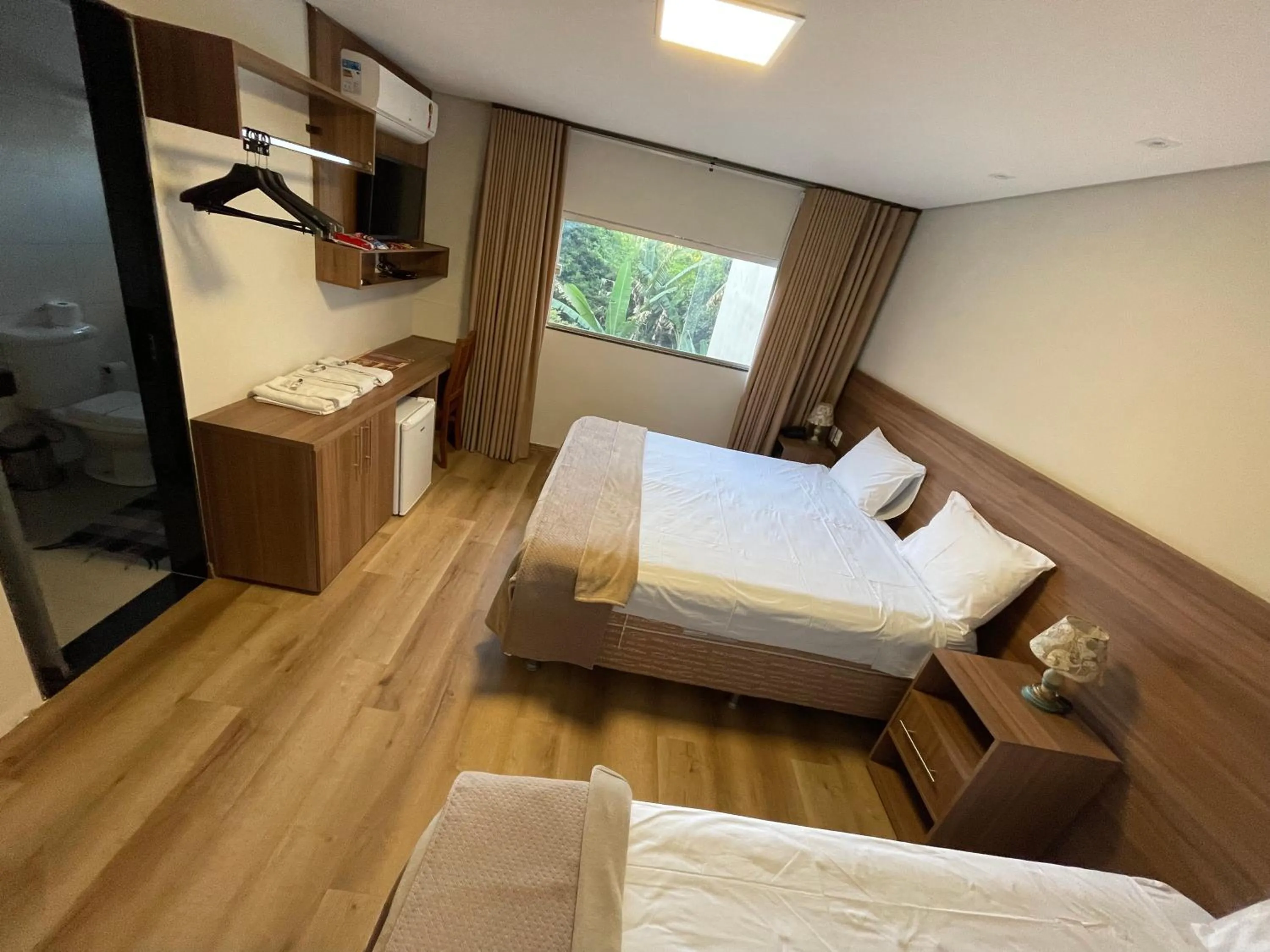 Bed in Pousada Circuito dos Inconfidentes