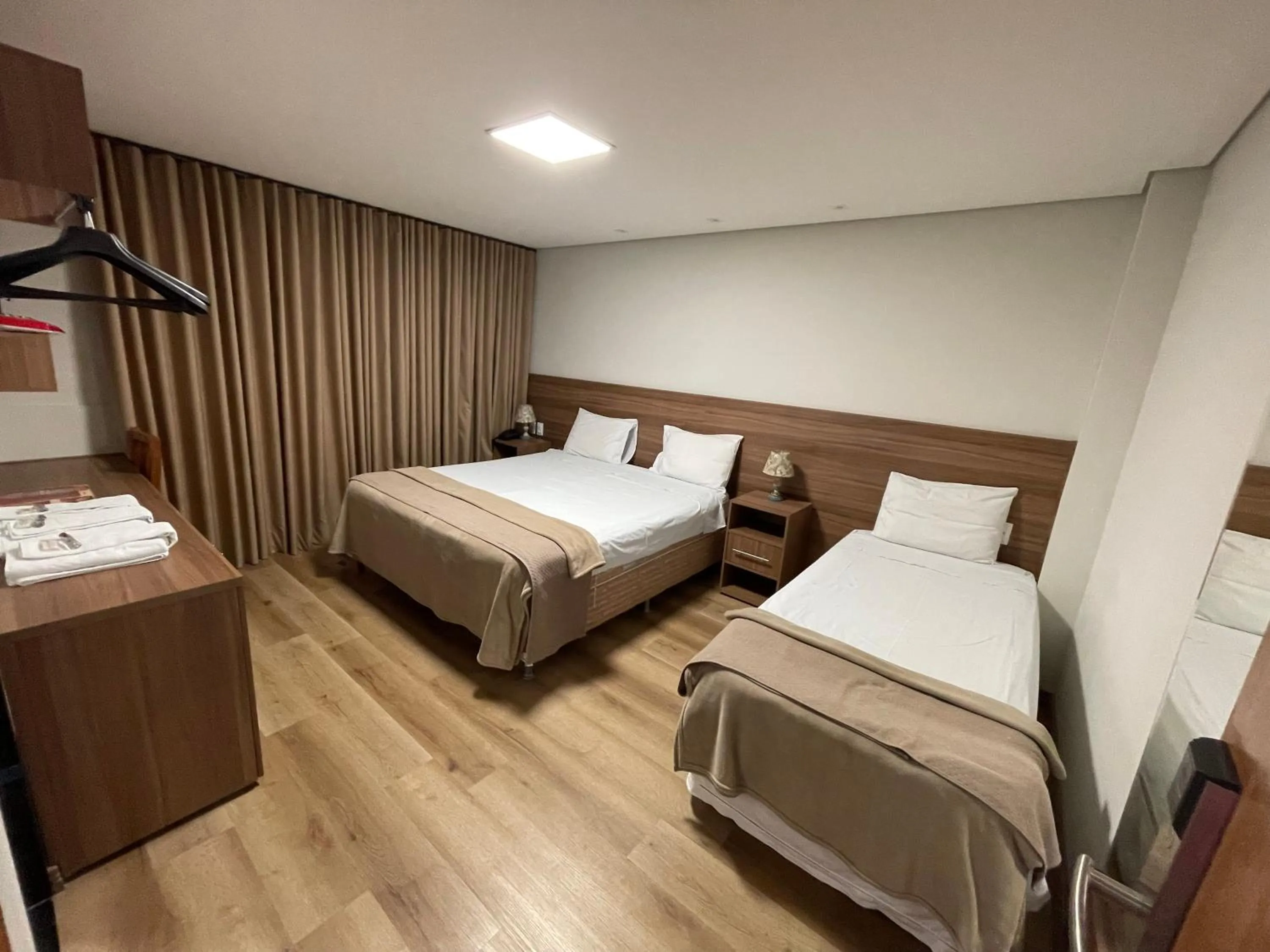 Bed in Pousada Circuito dos Inconfidentes