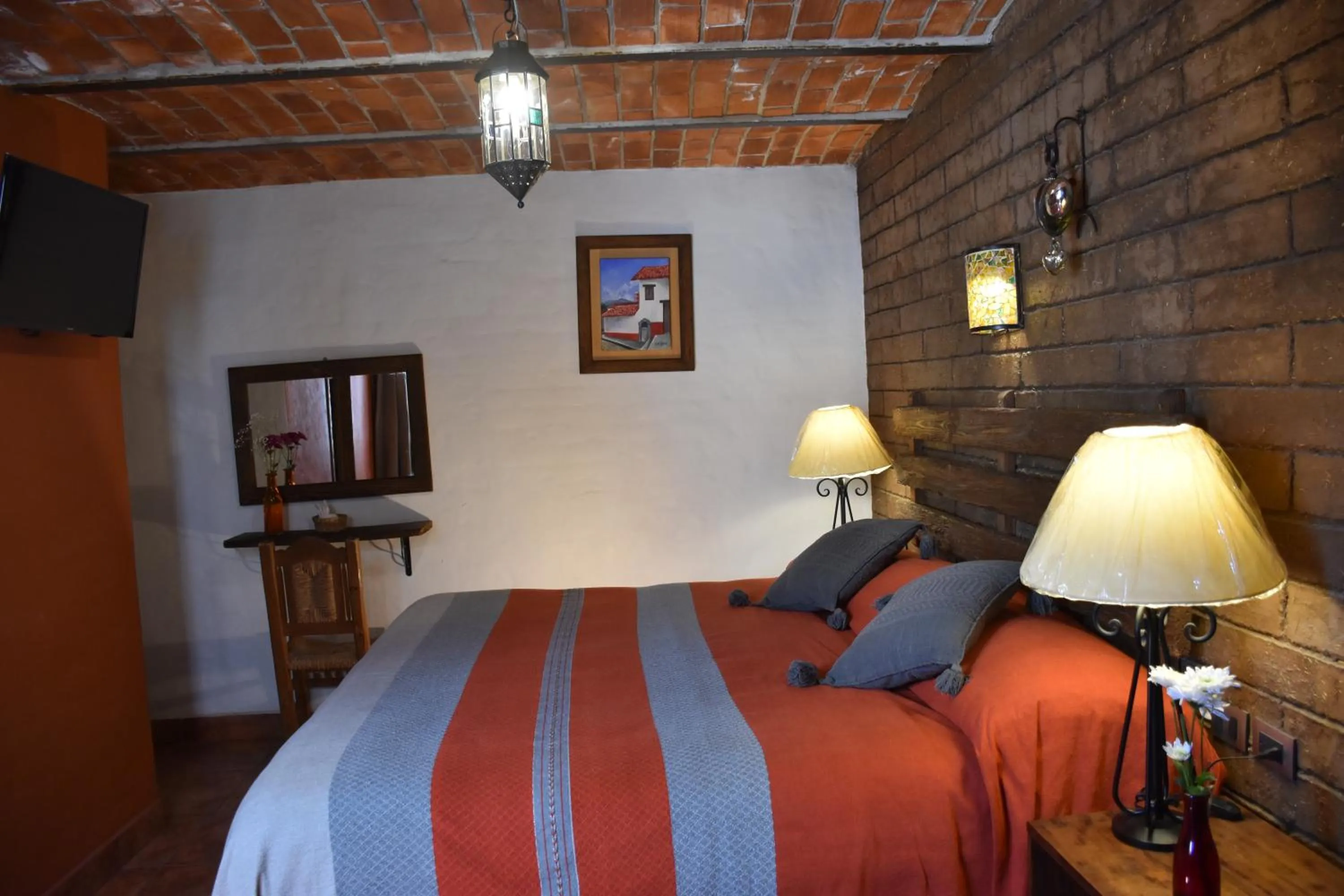 Photo of the whole room, Bed in Hotel Mi Pueblito Tapalpa