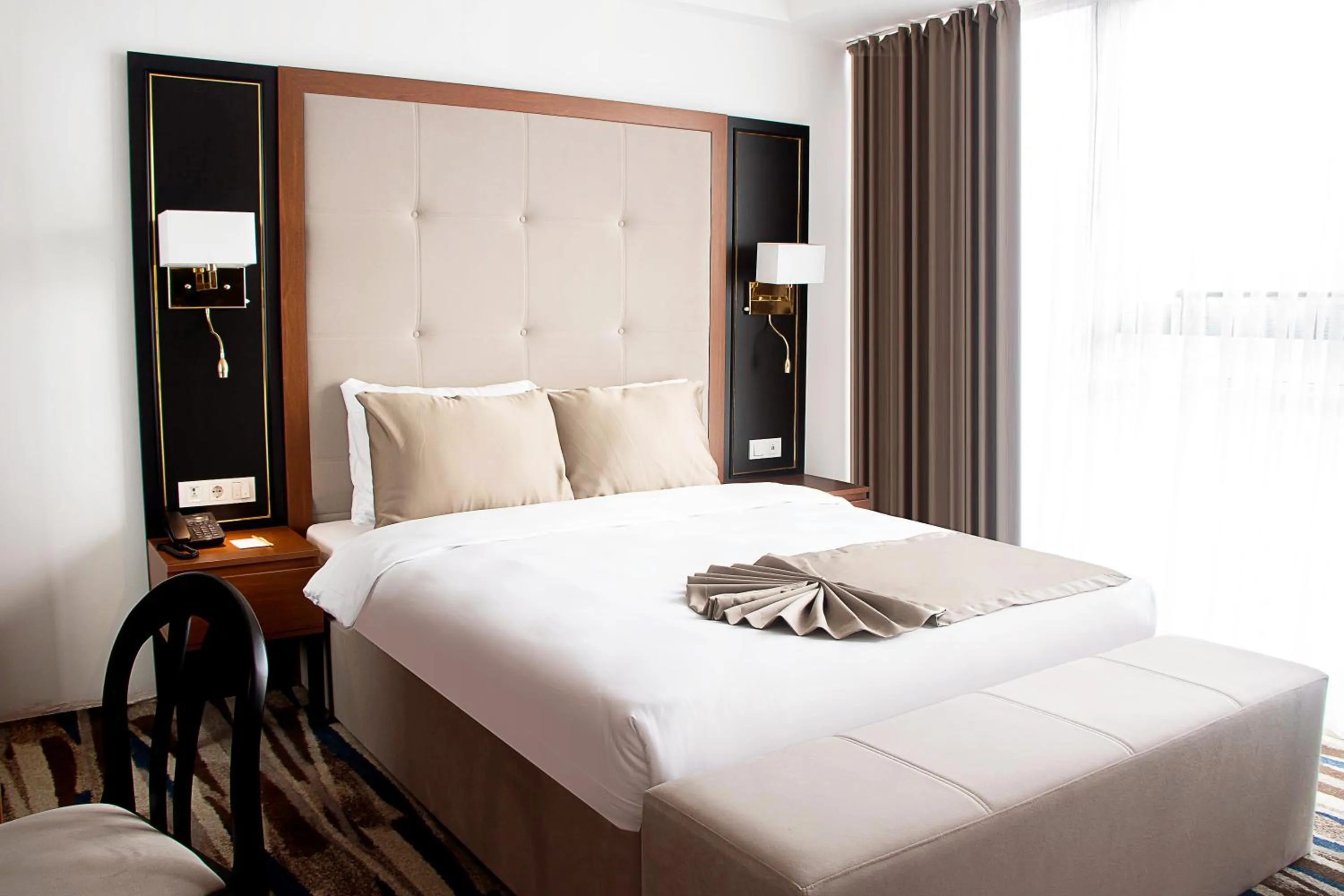 Bed in Shelter Inn Hotel & Spa