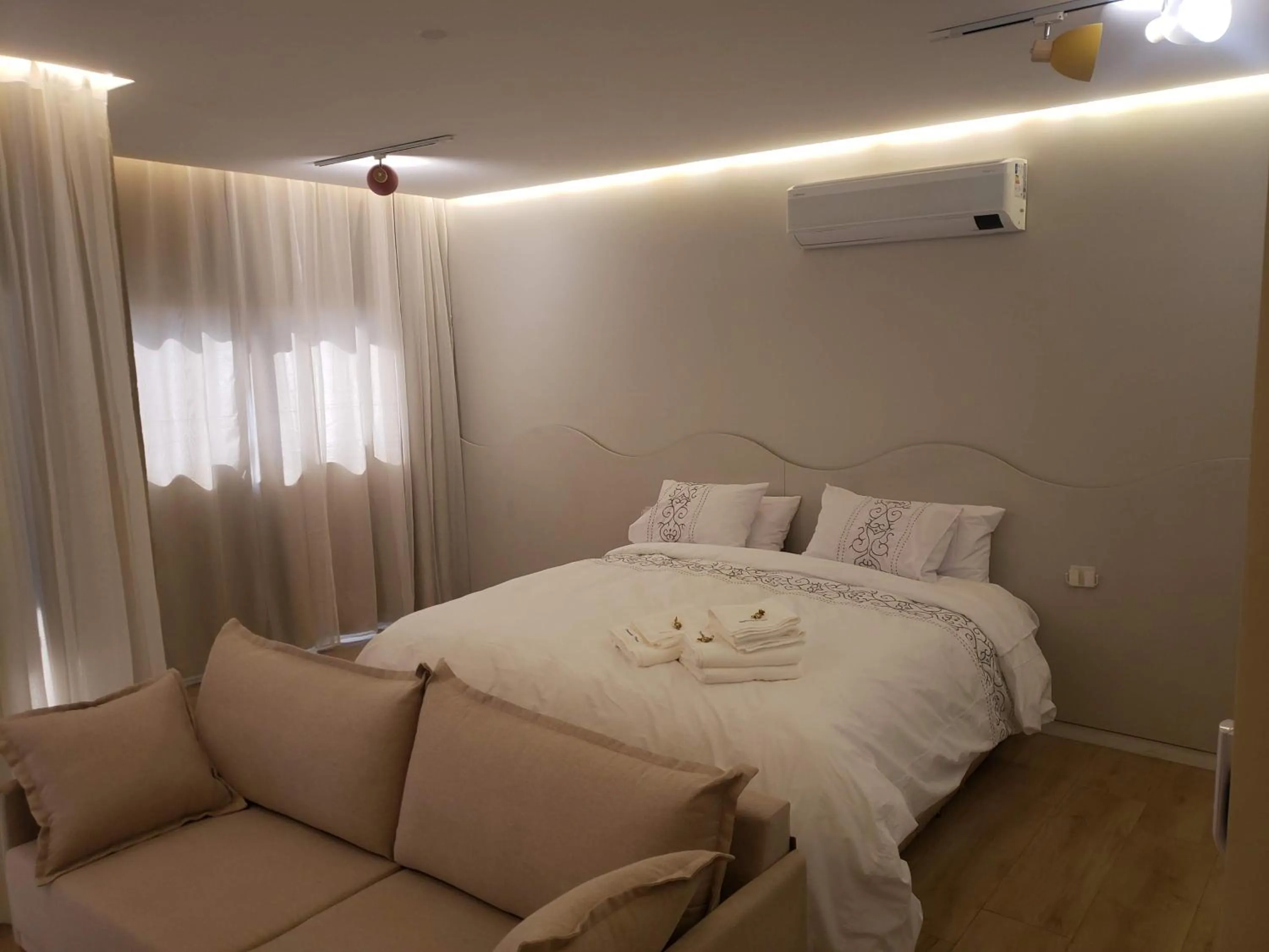 Bed in Apart-hotel Theotókos Flats