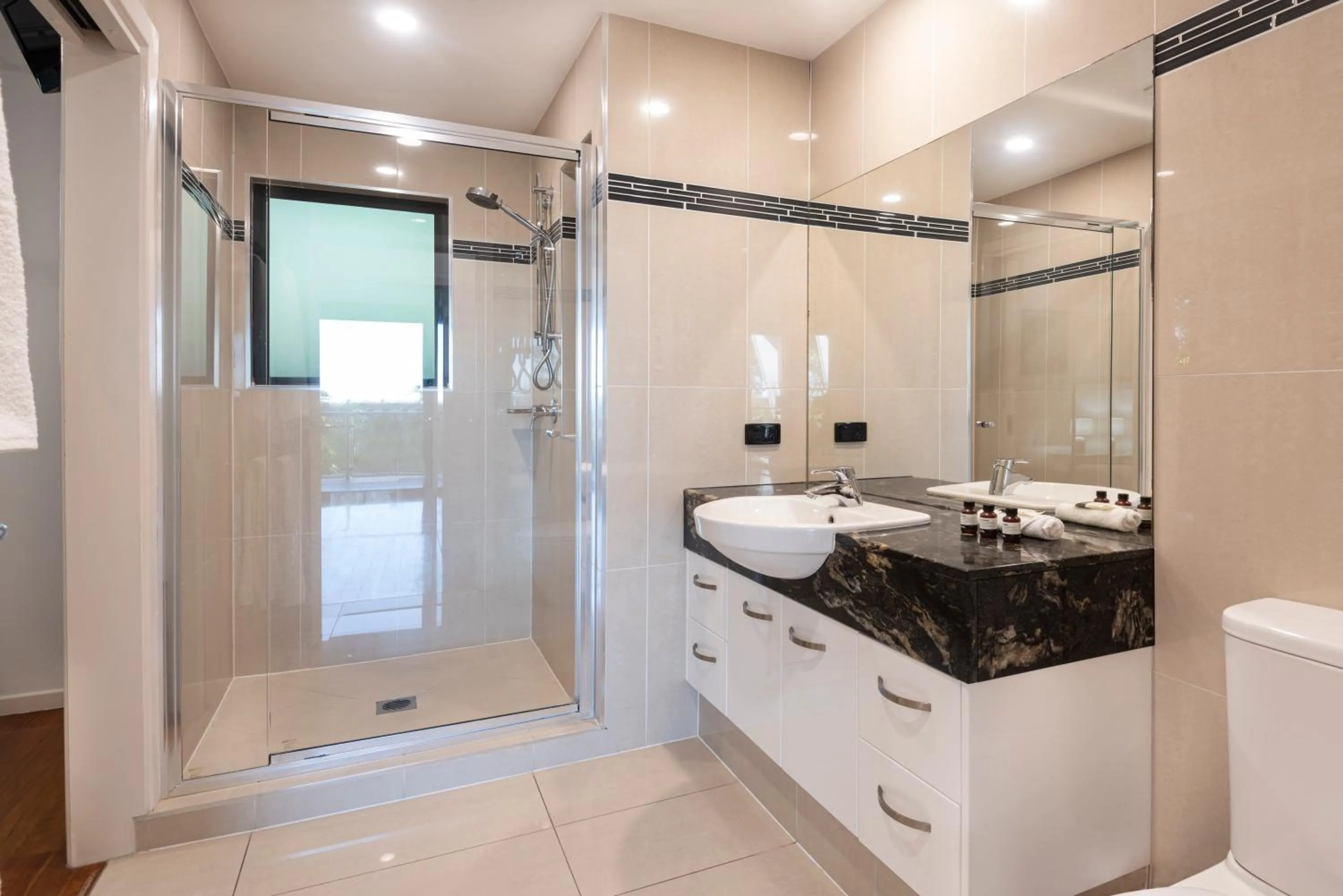 Bathroom in Pinnacle Apartments on Hamilton Island by HIHA