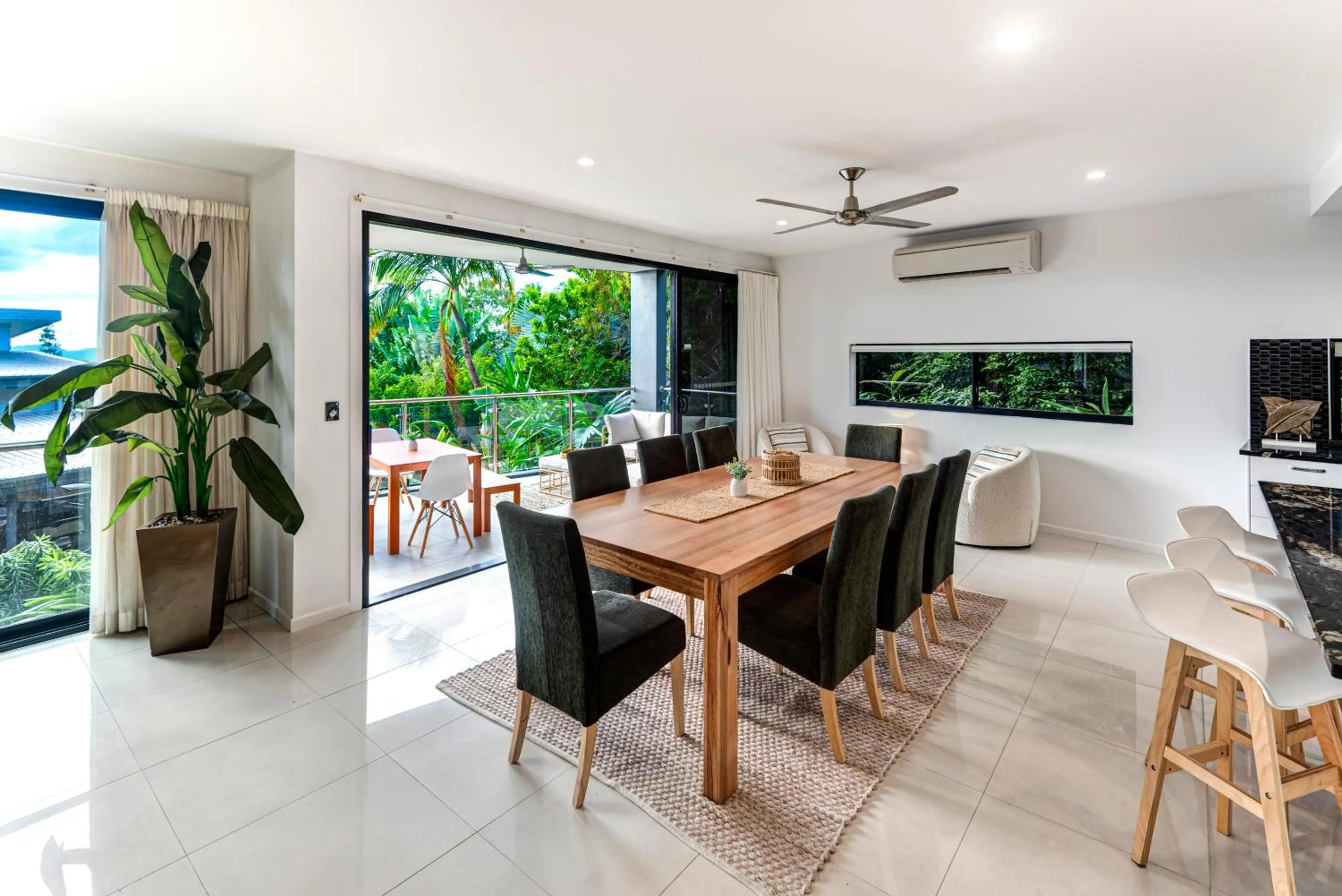 Dining area in Pinnacle Apartments on Hamilton Island by HIHA
