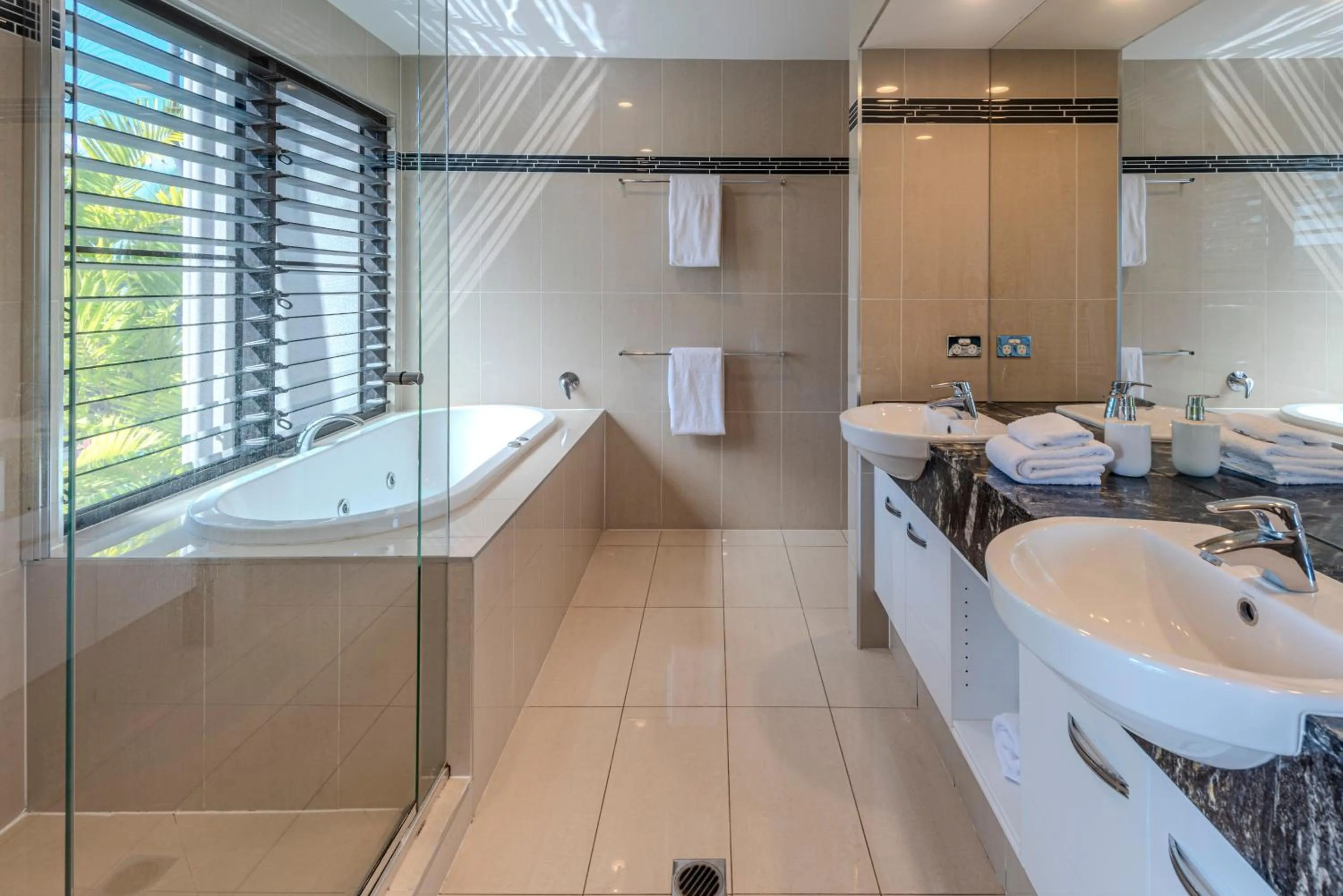 Bathroom in Pinnacle Apartments on Hamilton Island by HIHA