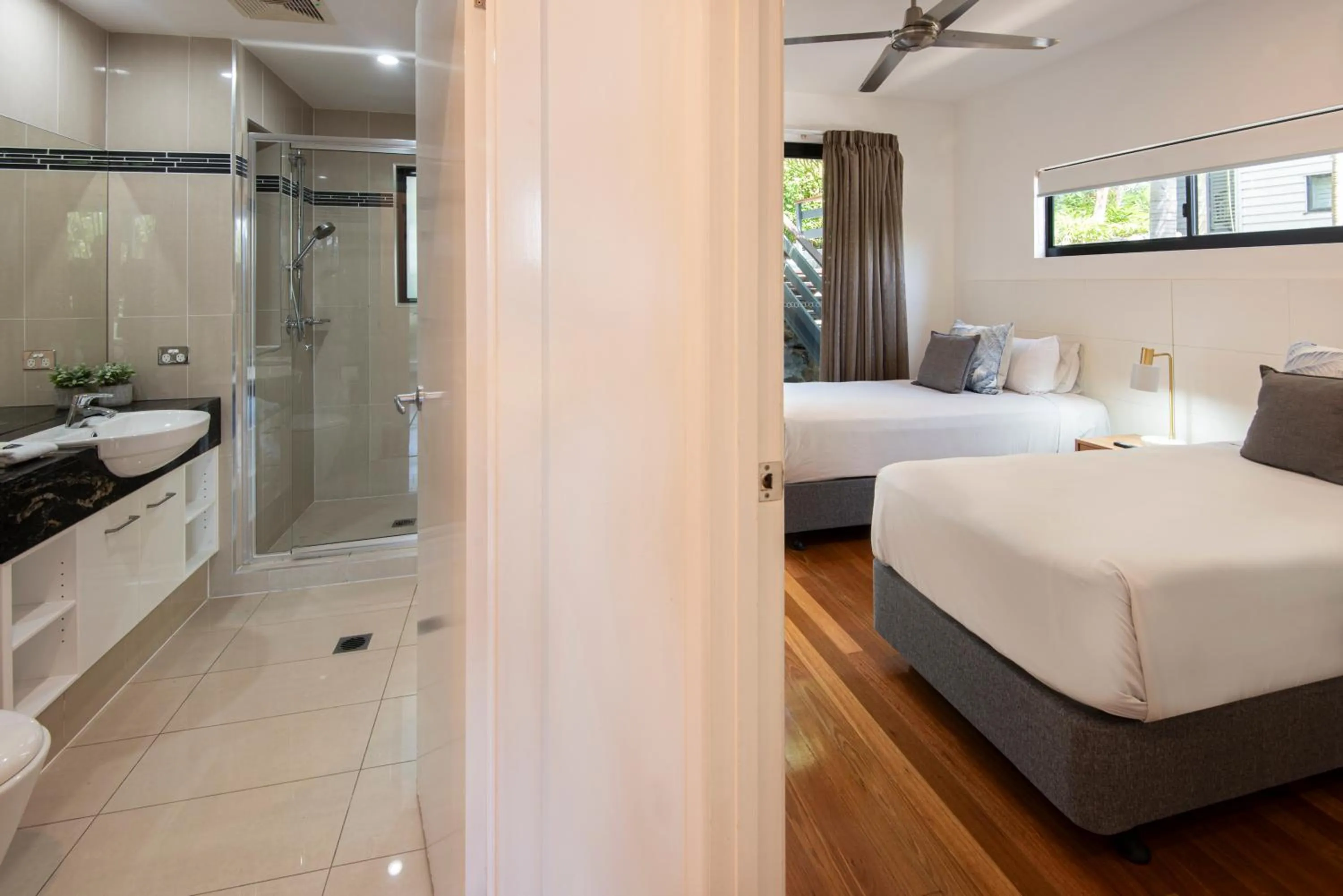 Bathroom, Bed in Pinnacle Apartments on Hamilton Island by HIHA