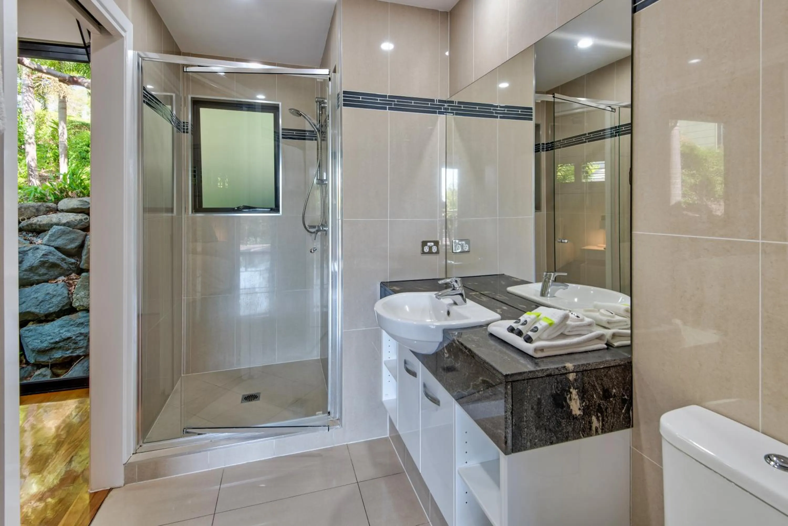 Bathroom in Pinnacle Apartments on Hamilton Island by HIHA
