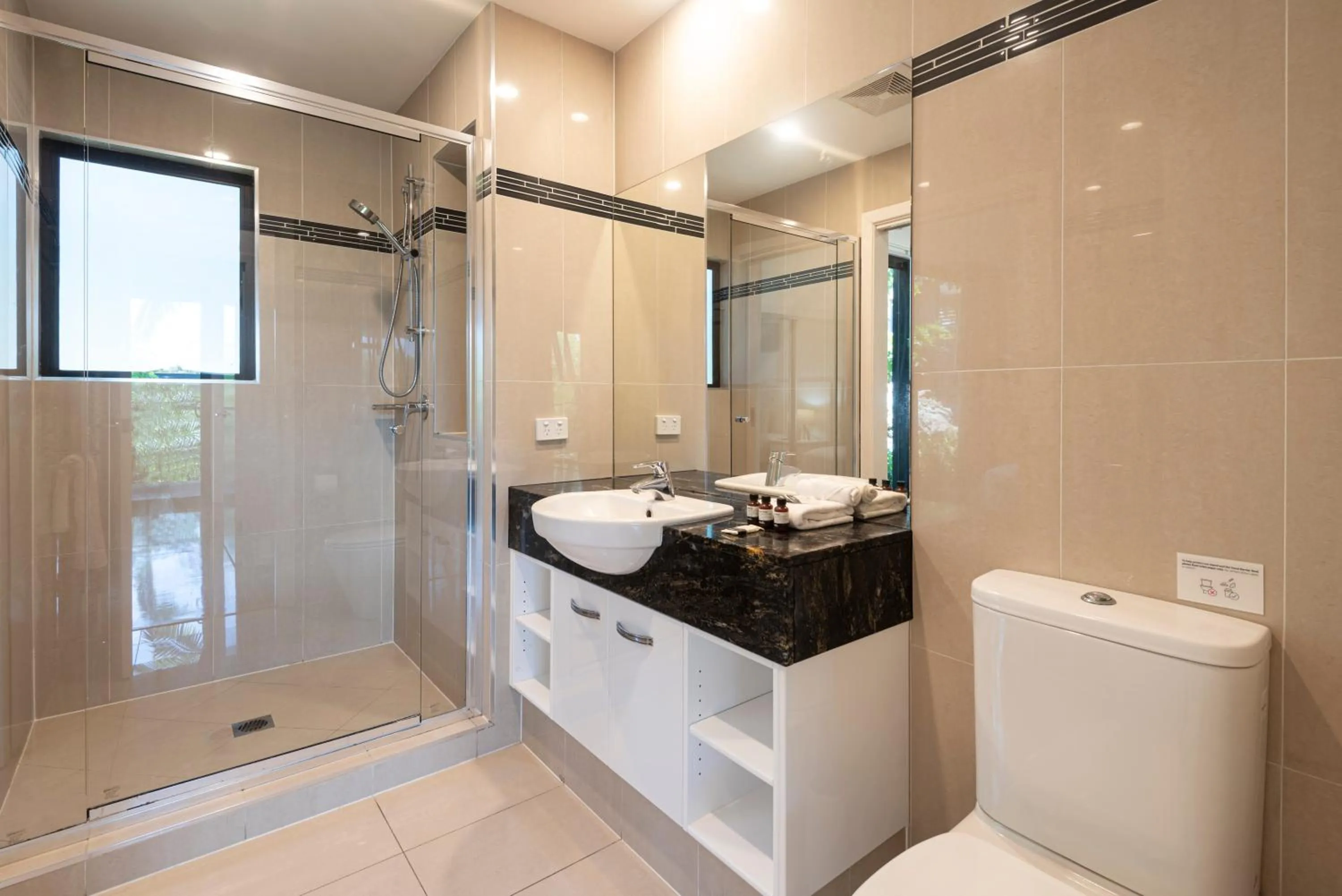 Bathroom in Pinnacle Apartments on Hamilton Island by HIHA