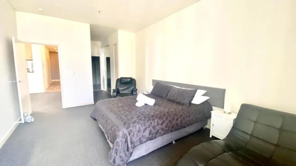 Bed in Solaire Apartments