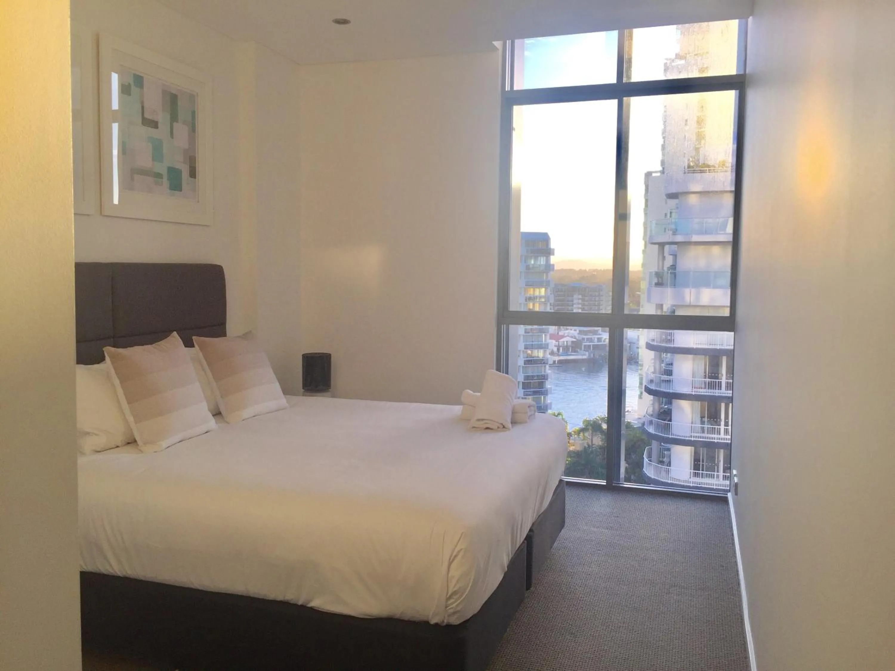 Bed in Solaire Apartments