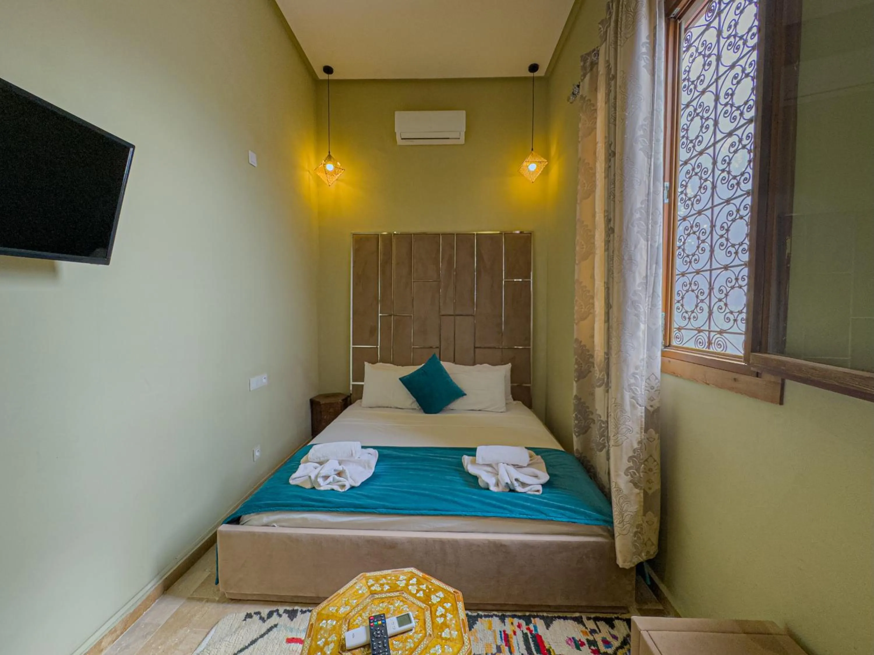 Bed in Riad Azia