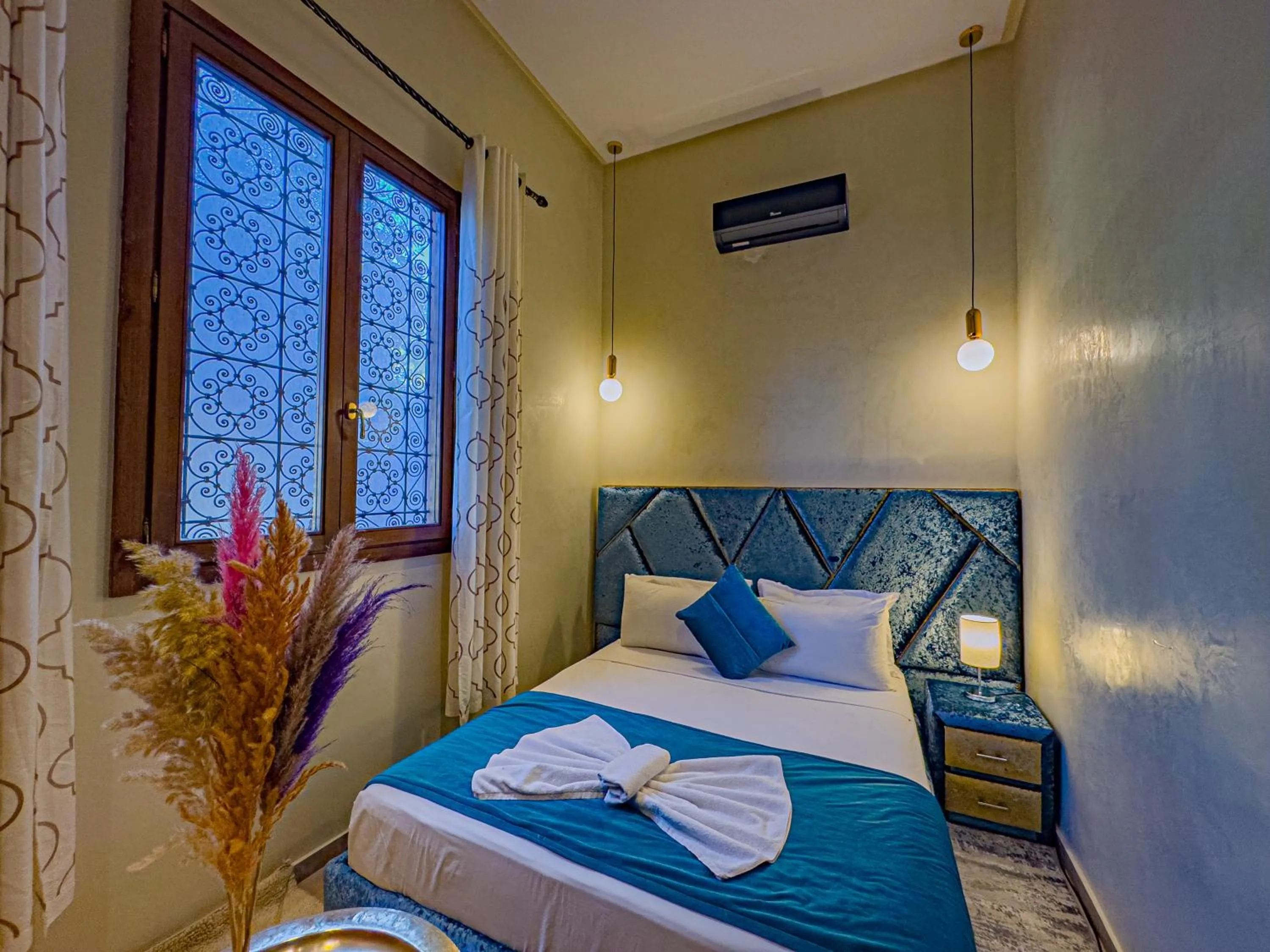Bed in Riad Azia
