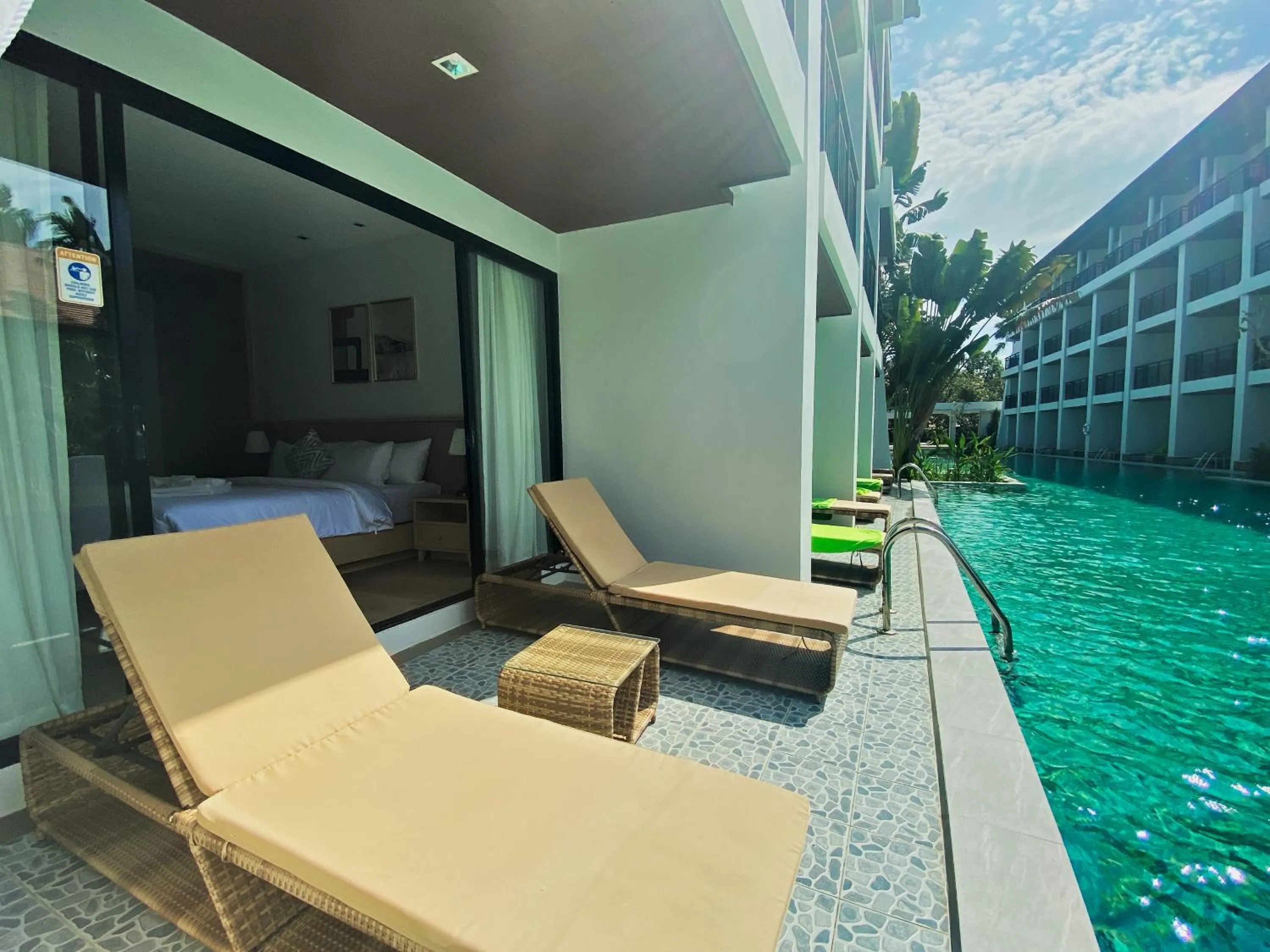 Swimming pool in D Varee Mai Khao Beach Resort, Thailand