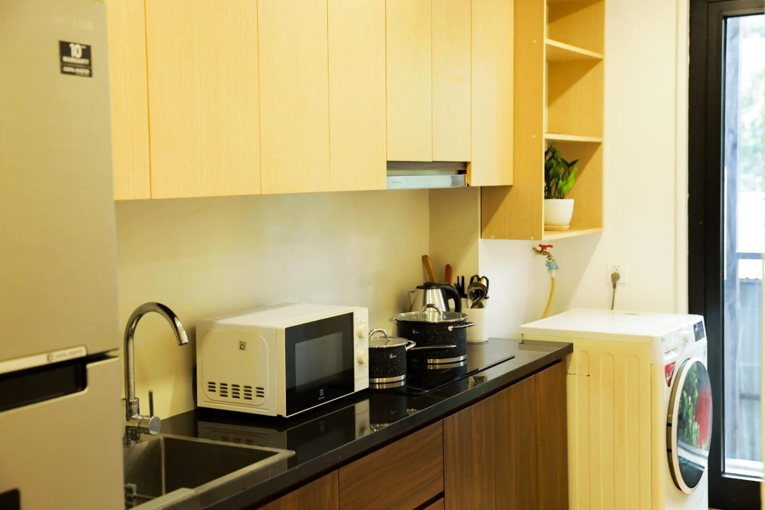 Kitchen or kitchenette in Wins Apartment