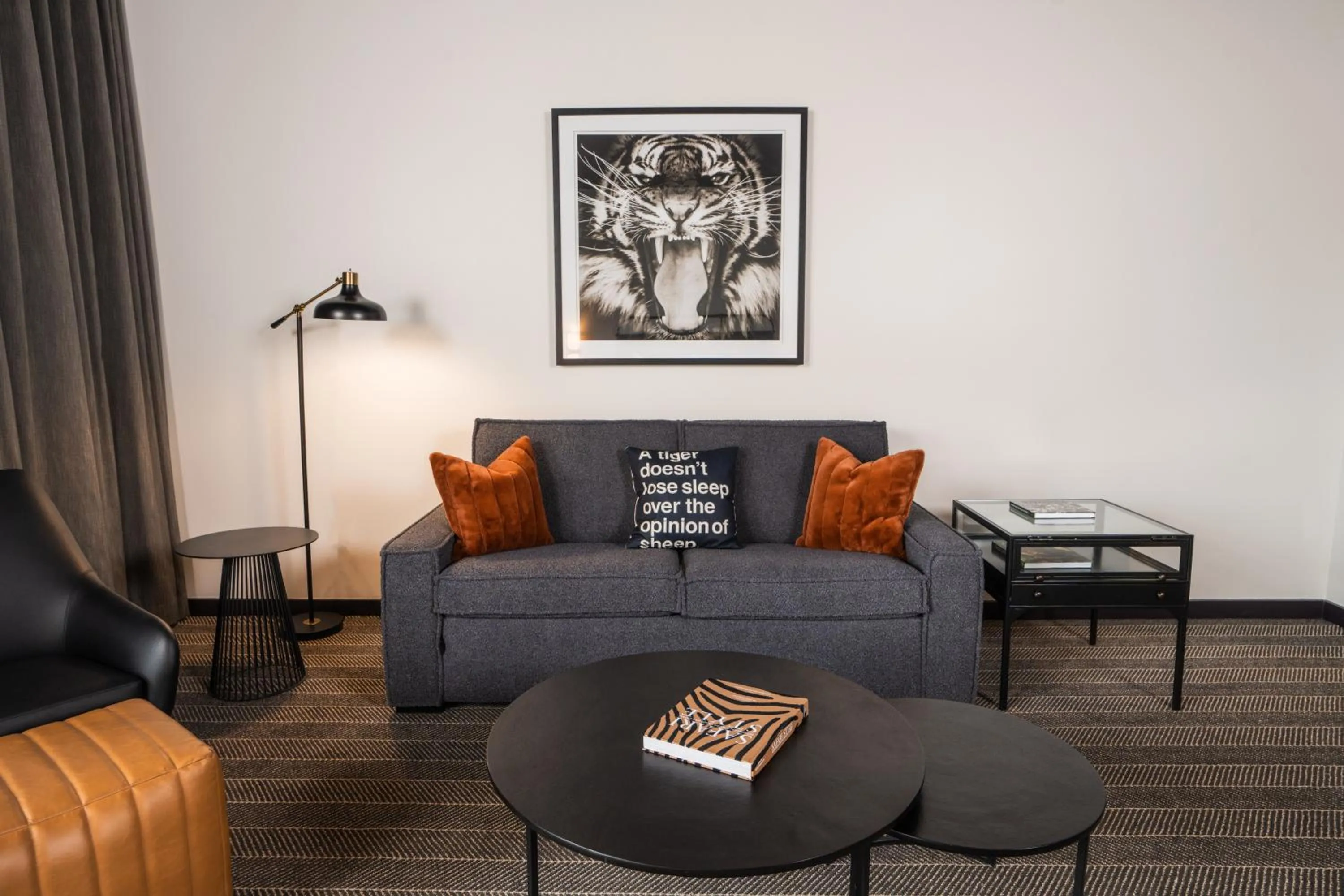 Living room in Origin Baton Rouge, a Wyndham Hotel