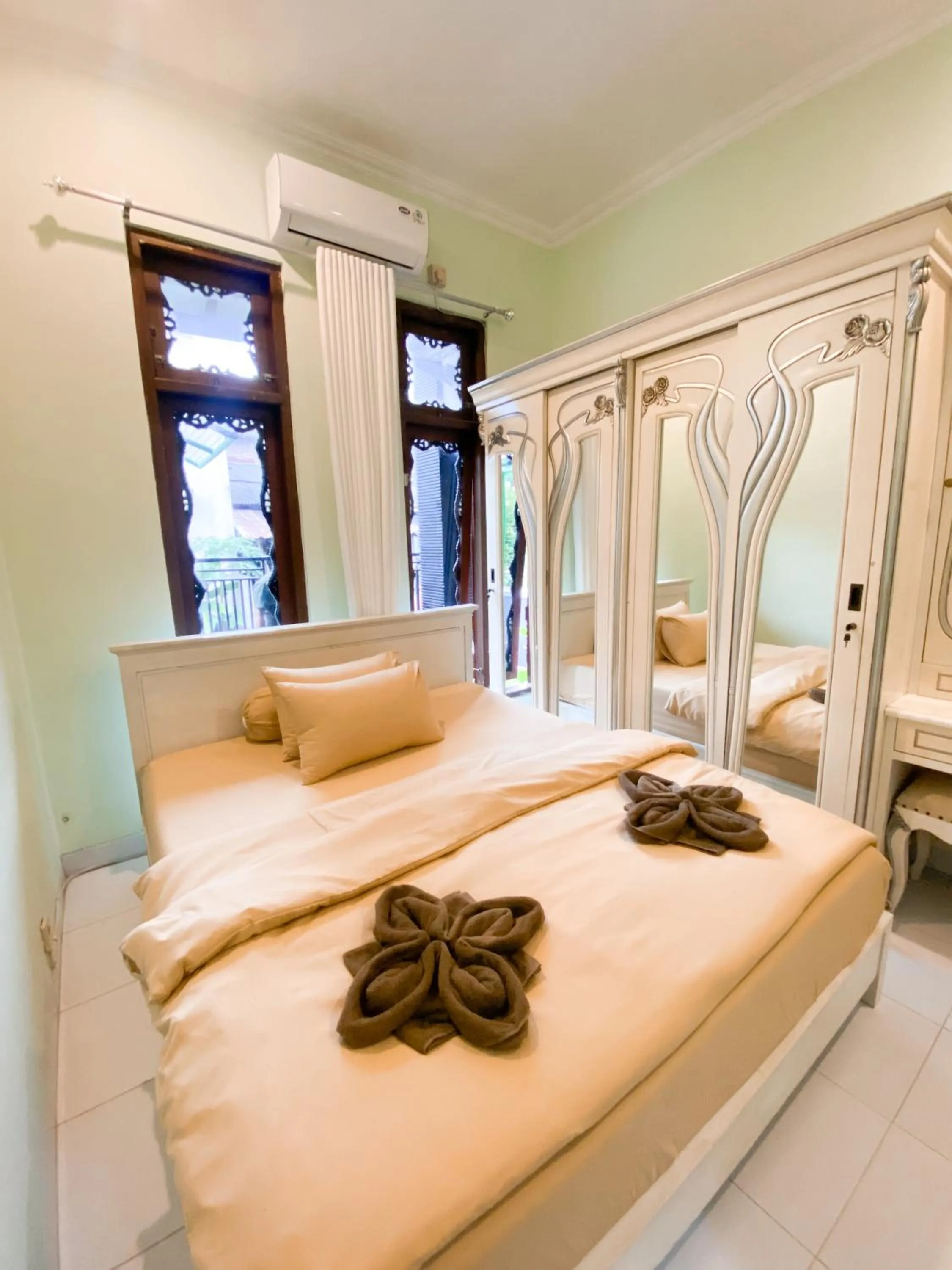 Bed in Homestay Kamar Tamu Gedongkiwo