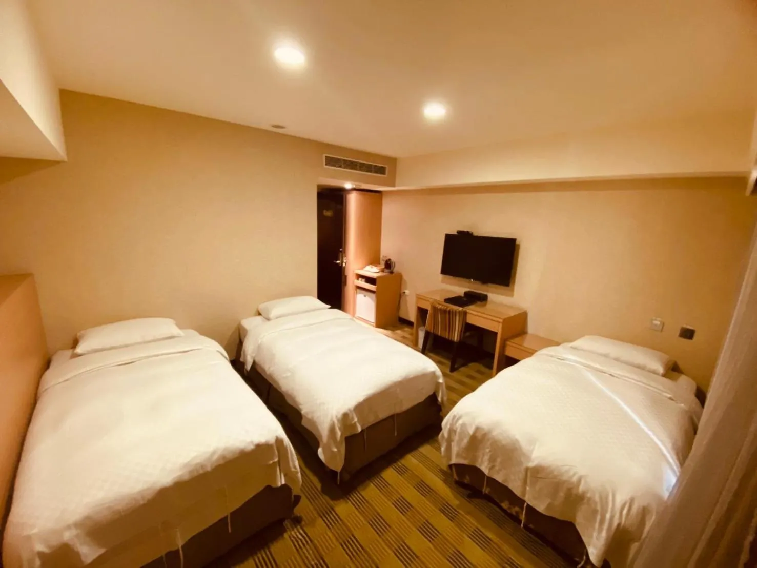 Bed in The Metro Hotel Taichung