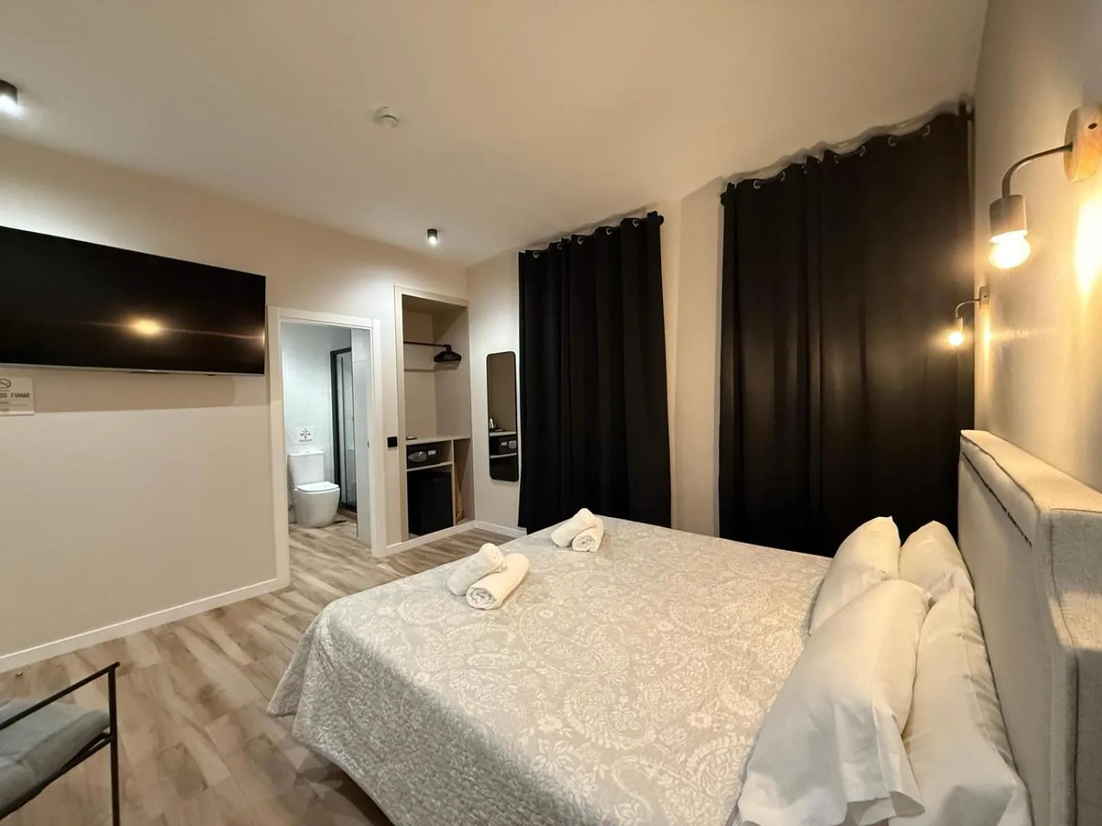 Photo of the whole room, Bed in CC Opera Suites