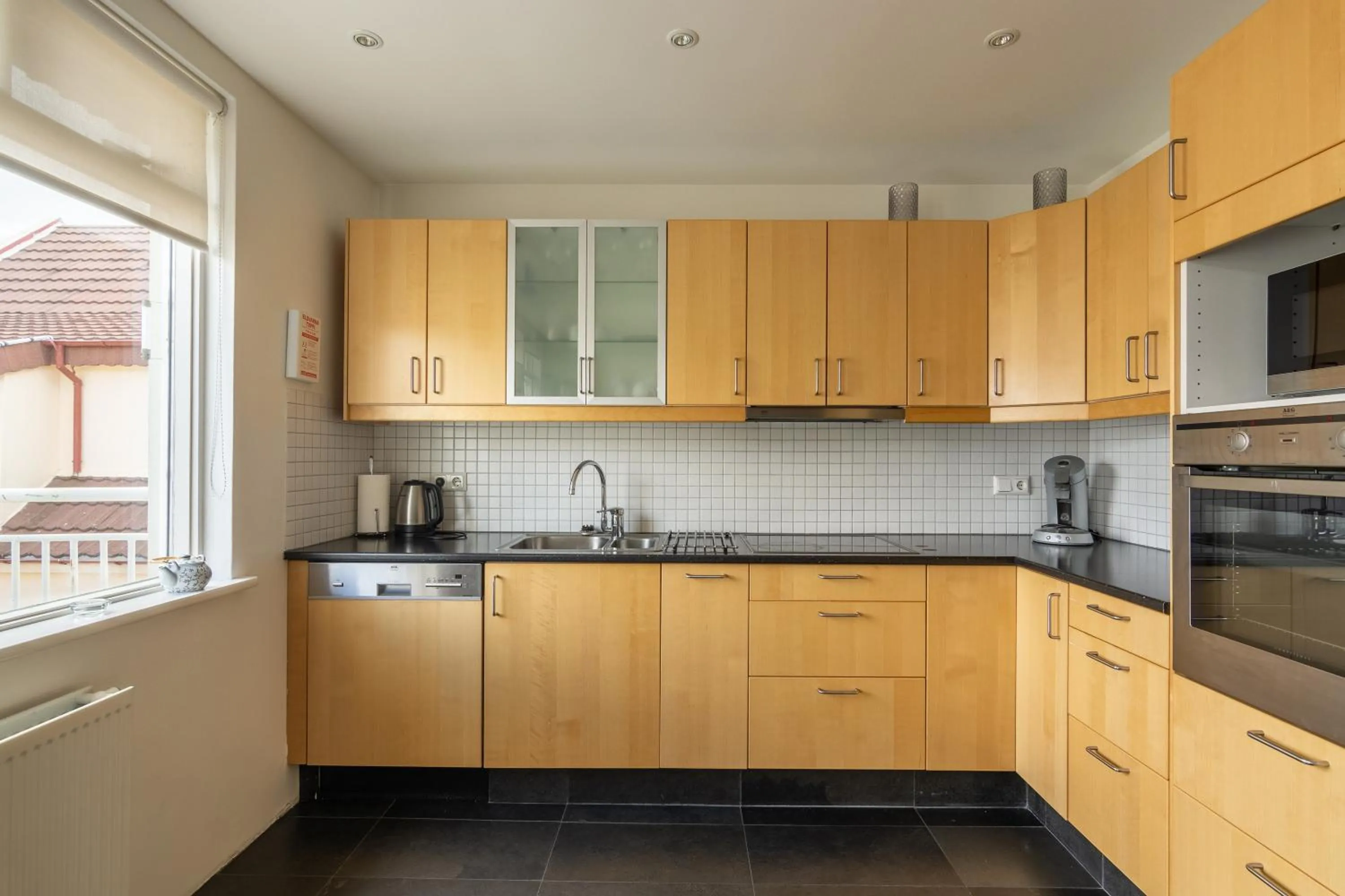 Kitchen or kitchenette in Acco Town Square Apartments