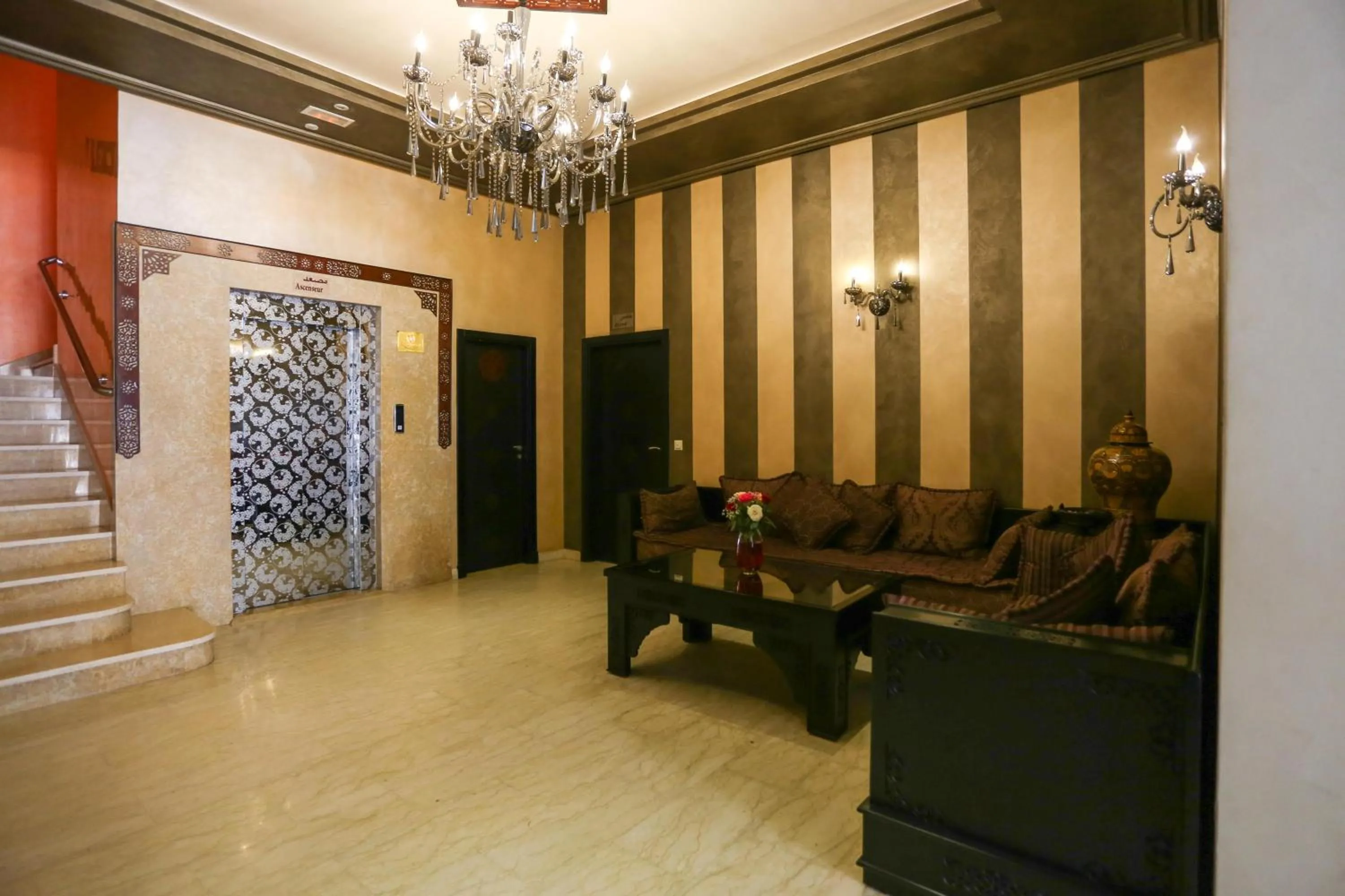 Living room in Hôtel Suite Martil