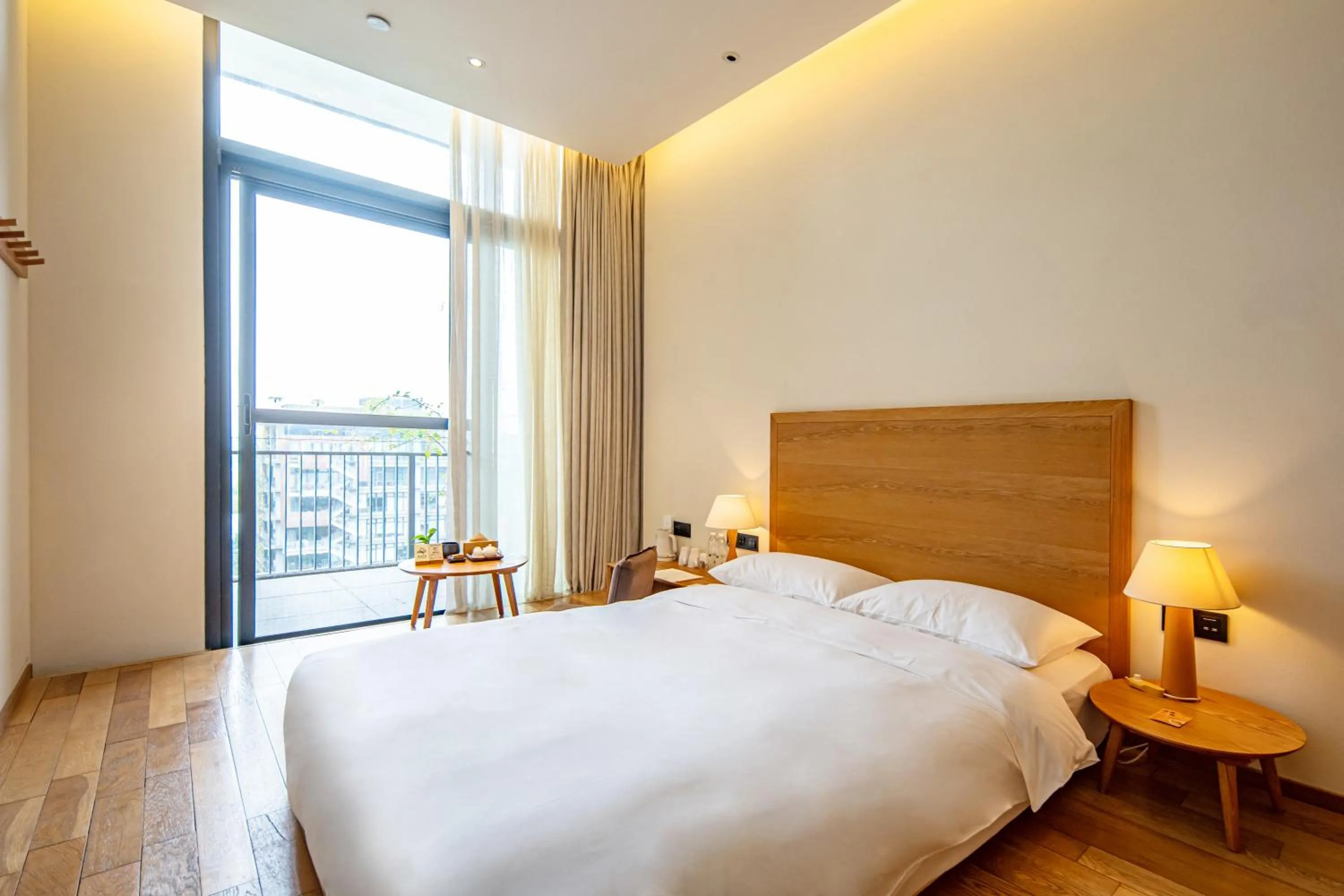 Bed in Taihua Wutong Hotel