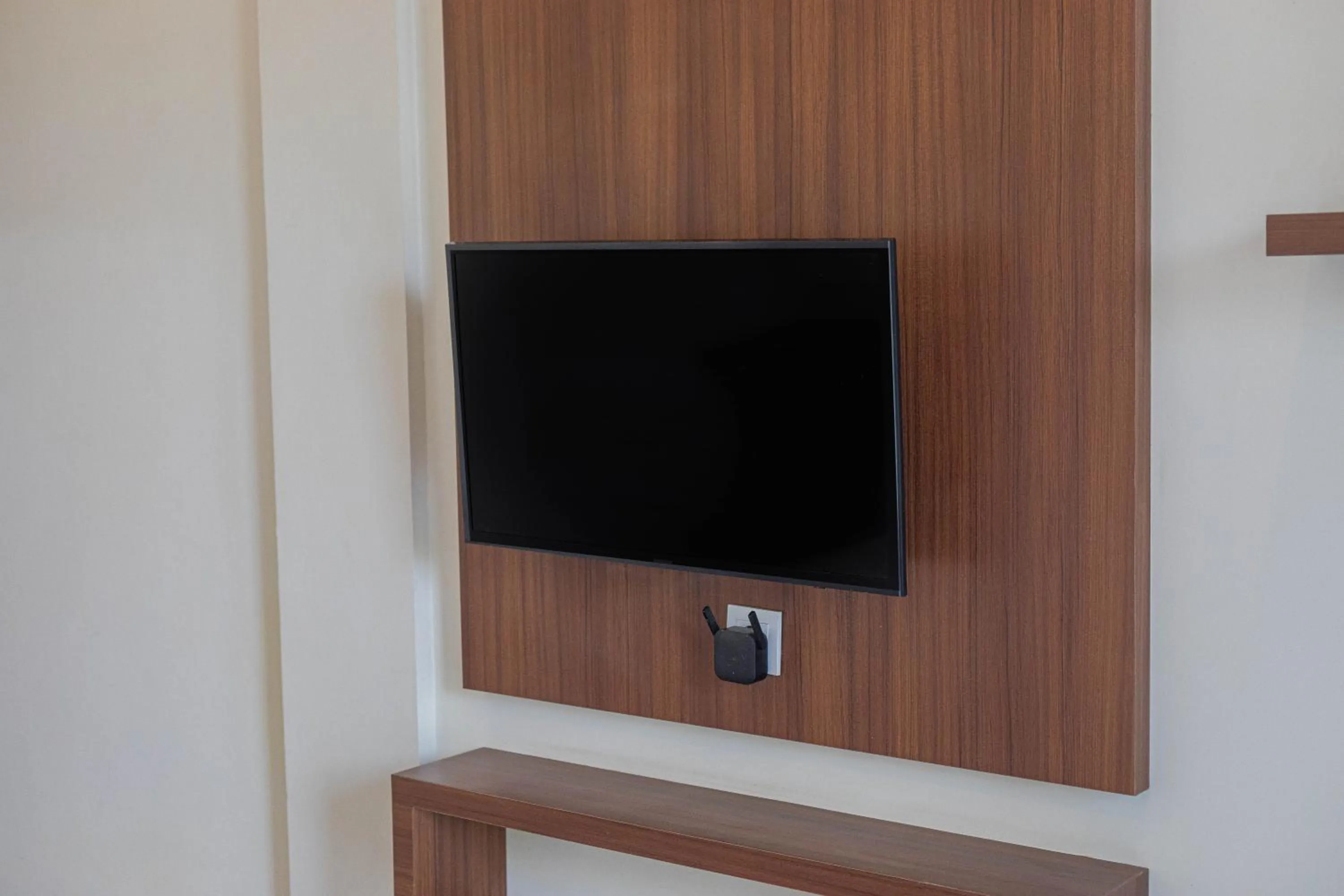 Communal lounge/ TV room in Sedana Cottage