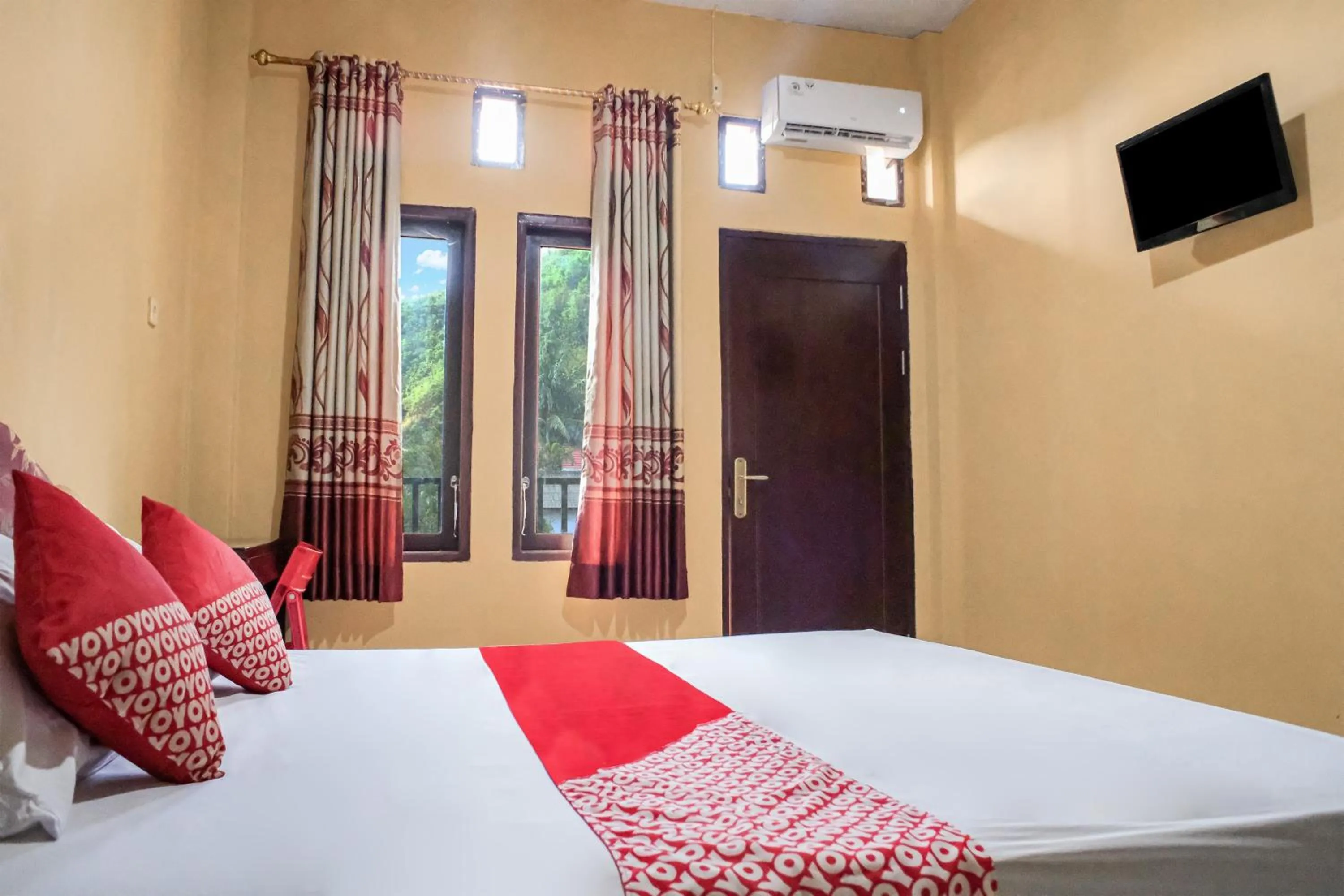 Bedroom, Bed in OYO 93332 Kharis Home Stay
