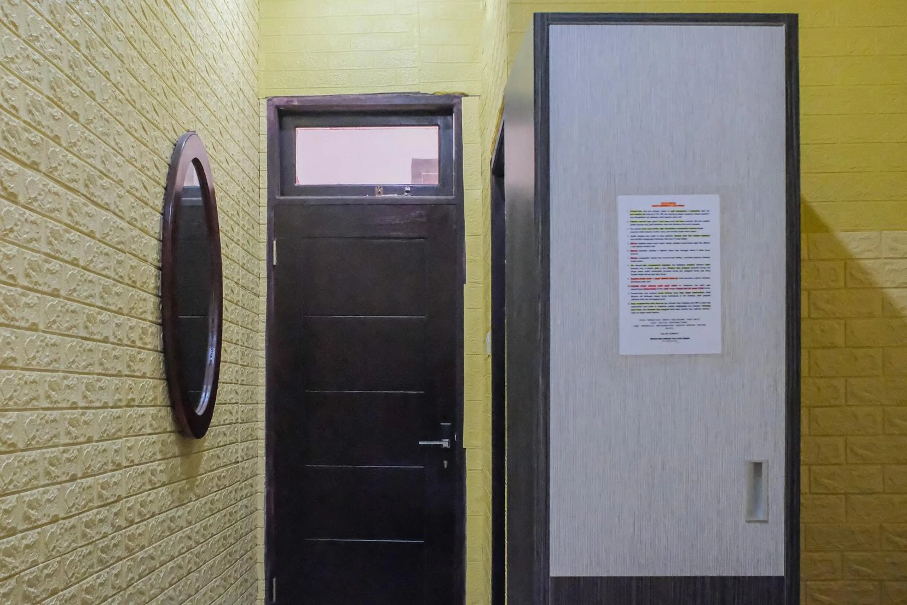 Bedroom in OYO 93333 Rama Home Stay