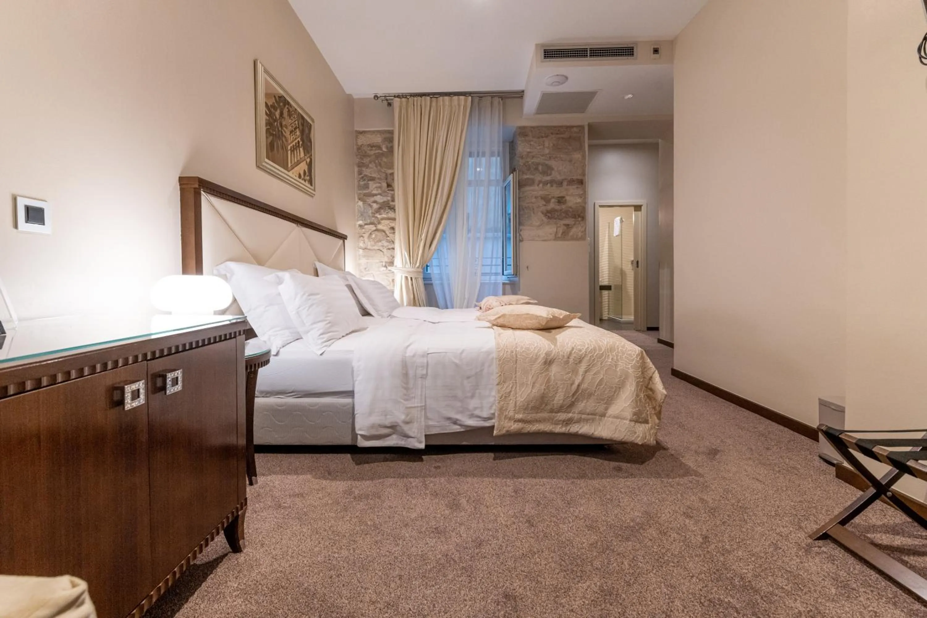 Bed in Heritage Hotel Antique Split