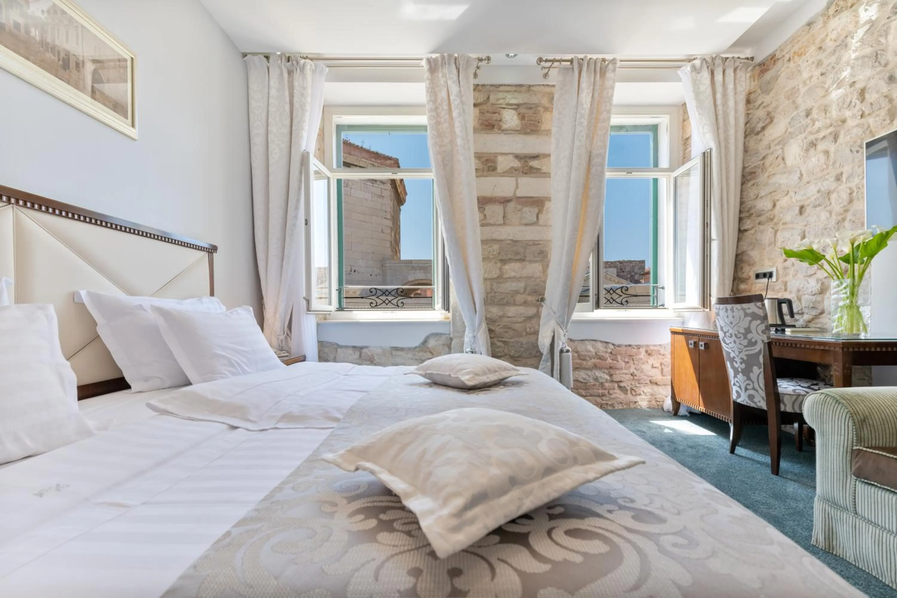 Bed in Heritage Hotel Antique Split