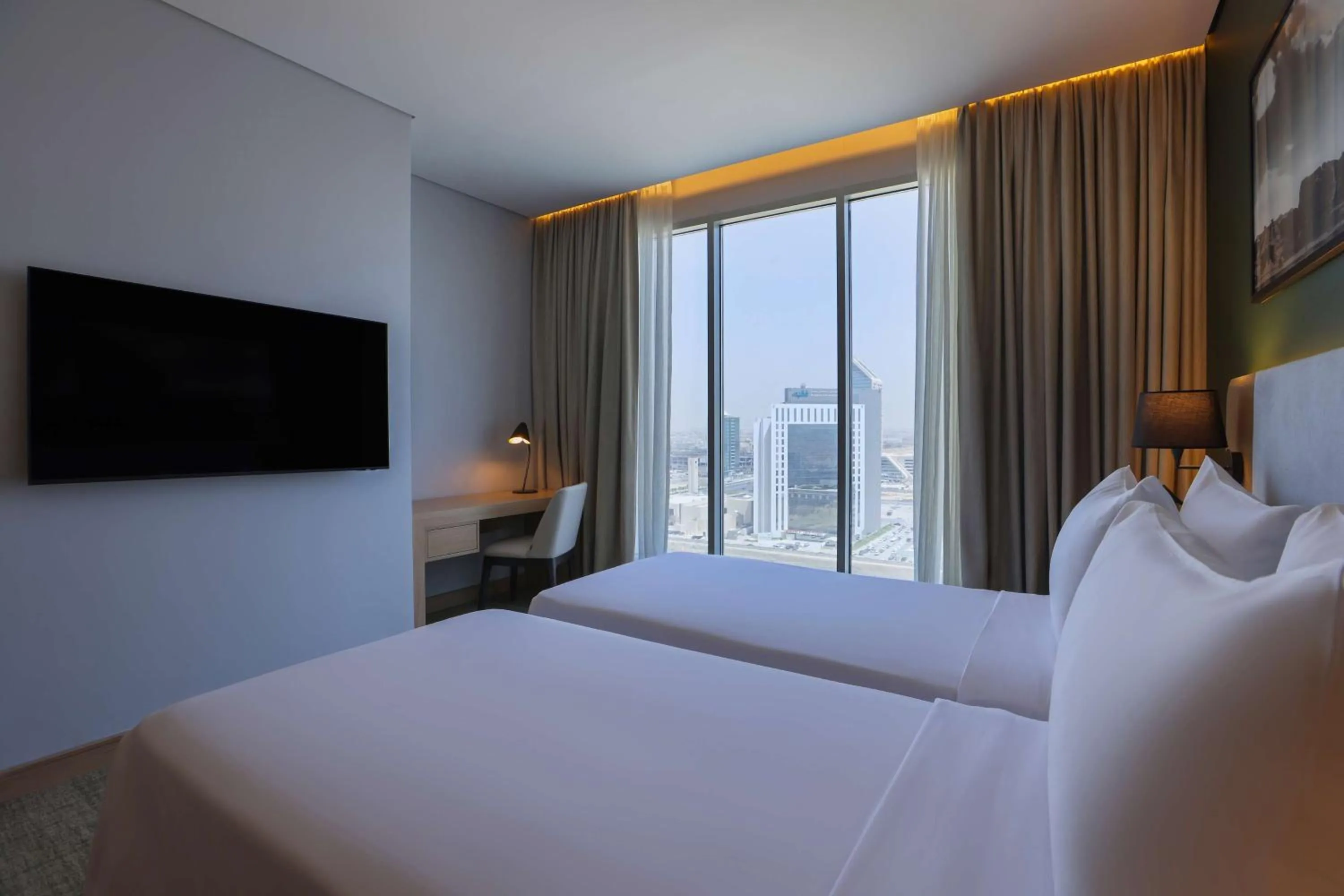 Bedroom, Bed in Radisson Hotel & Residence Riyadh Olaya