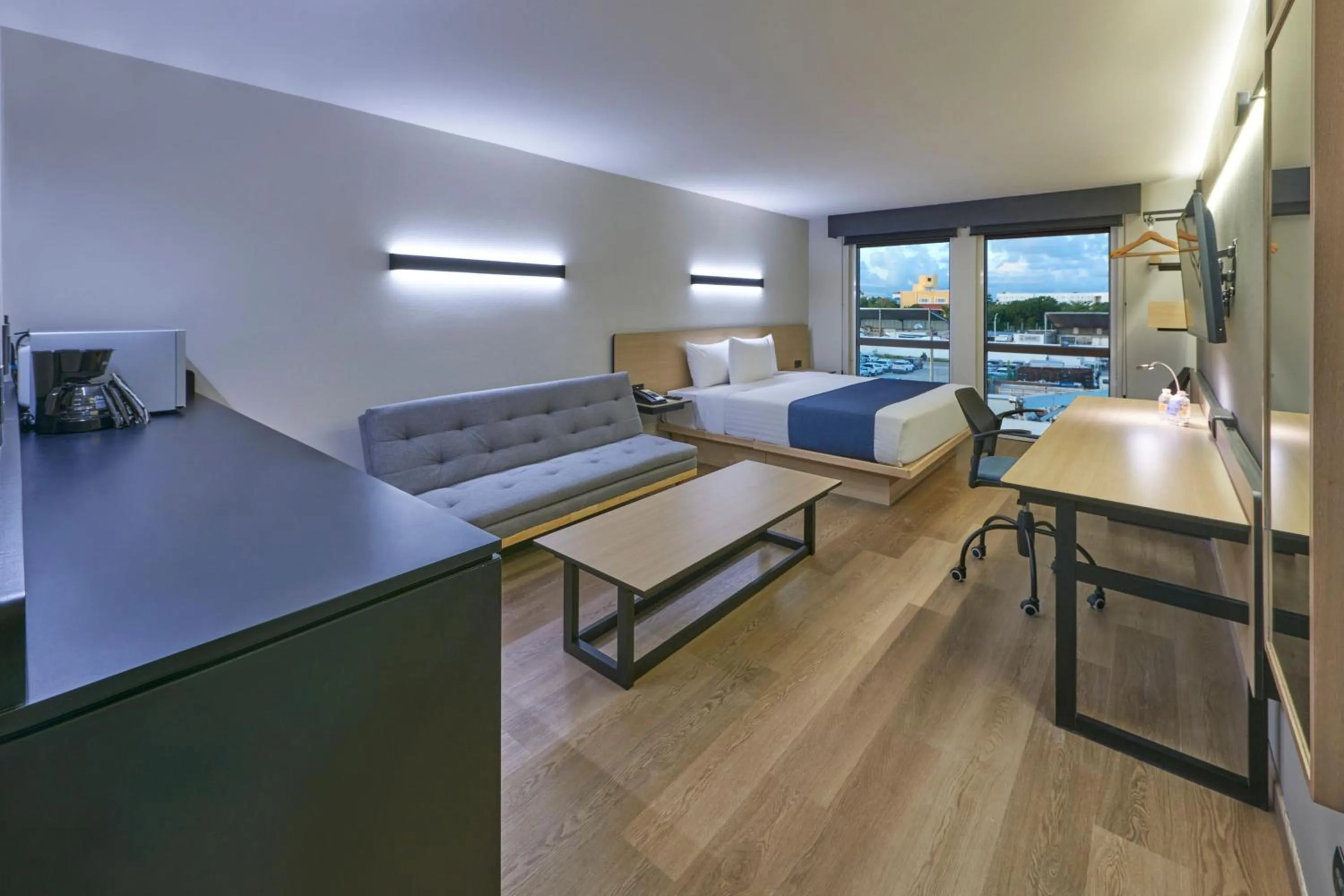 Photo of the whole room, Bed in City Express by Marriott Cancun Aeropuerto