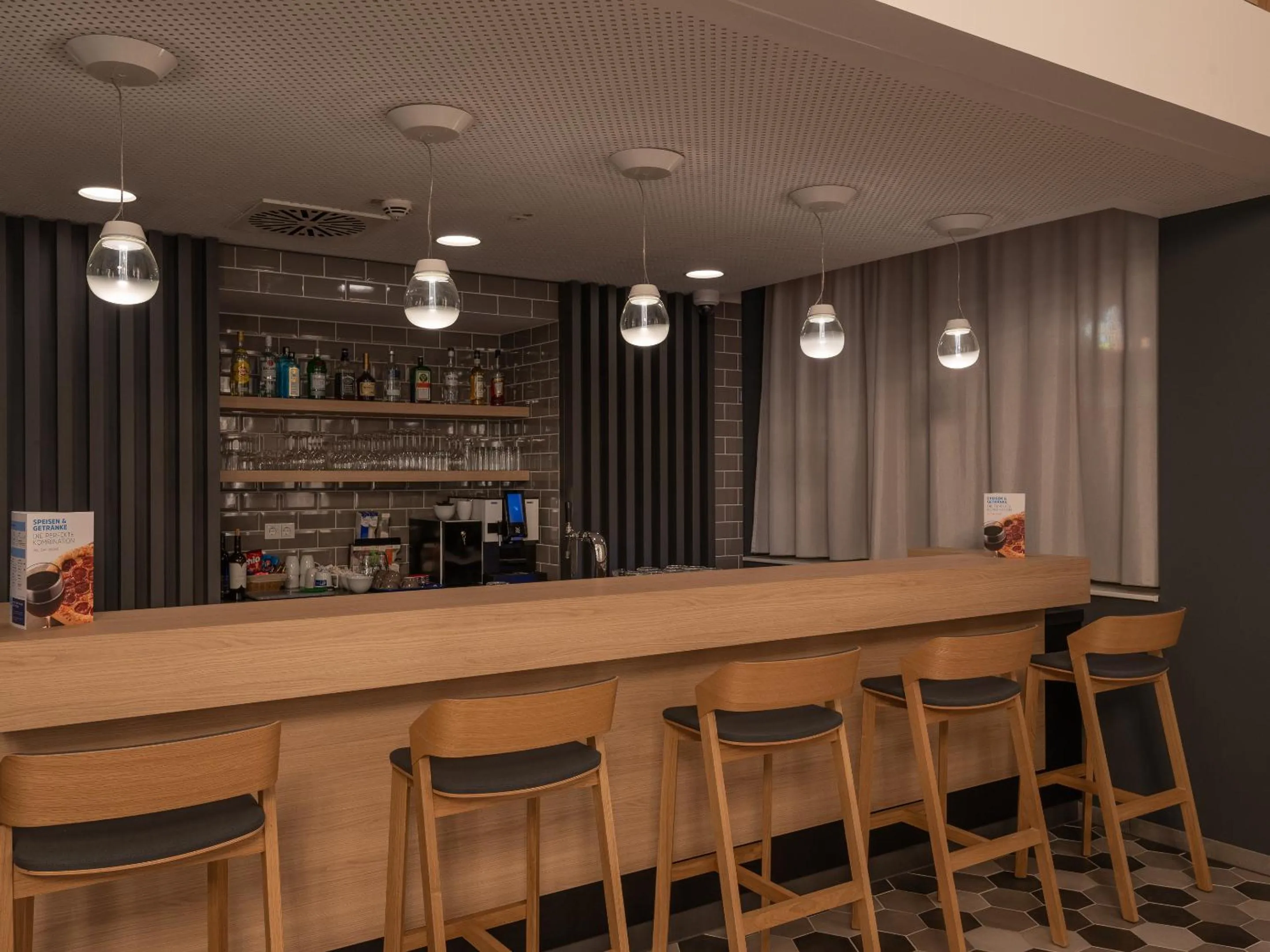 Lounge or bar in Holiday Inn Express Heilbronn by IHG