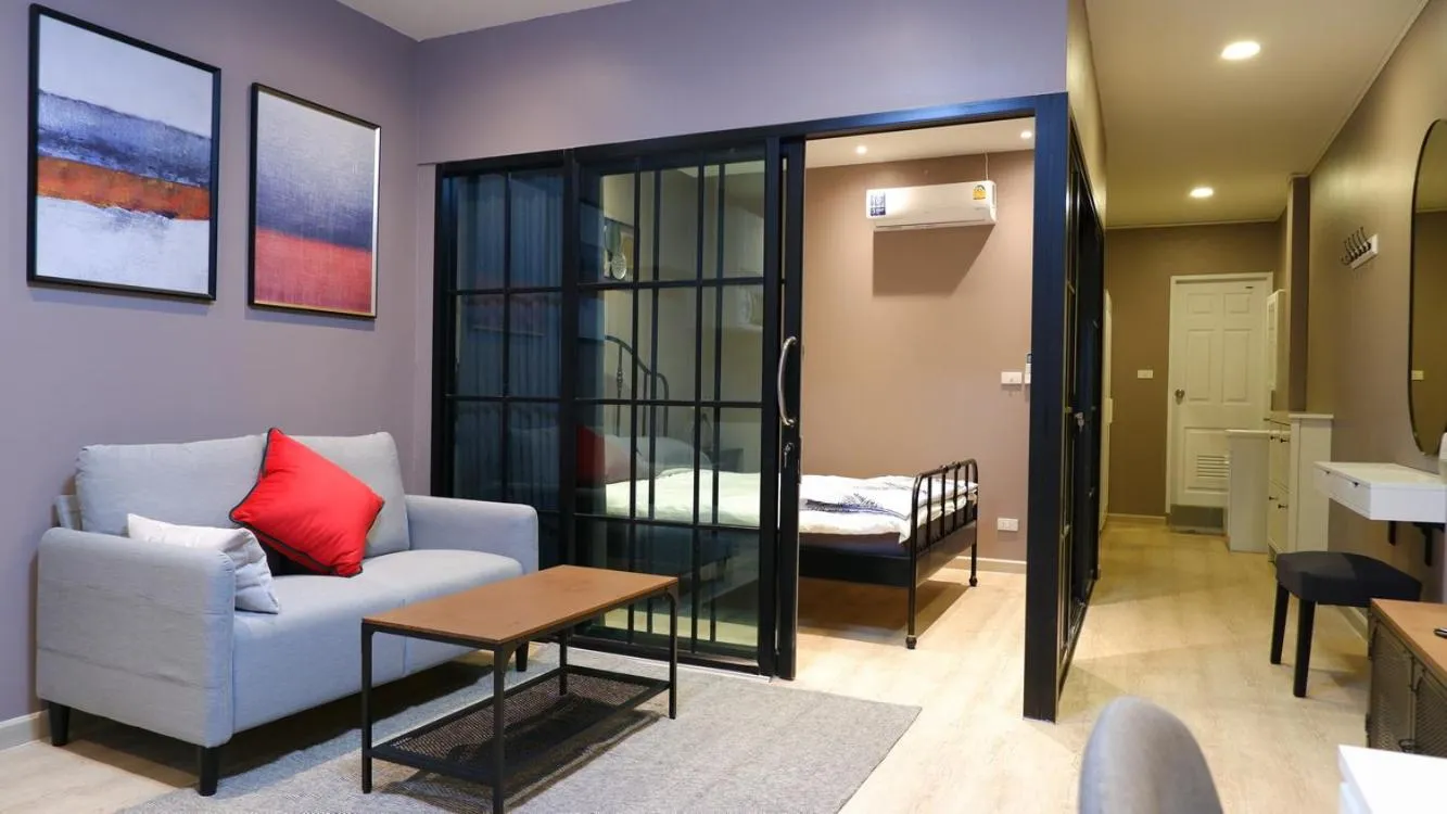 Living room, Bed in BEB Silom Condolette