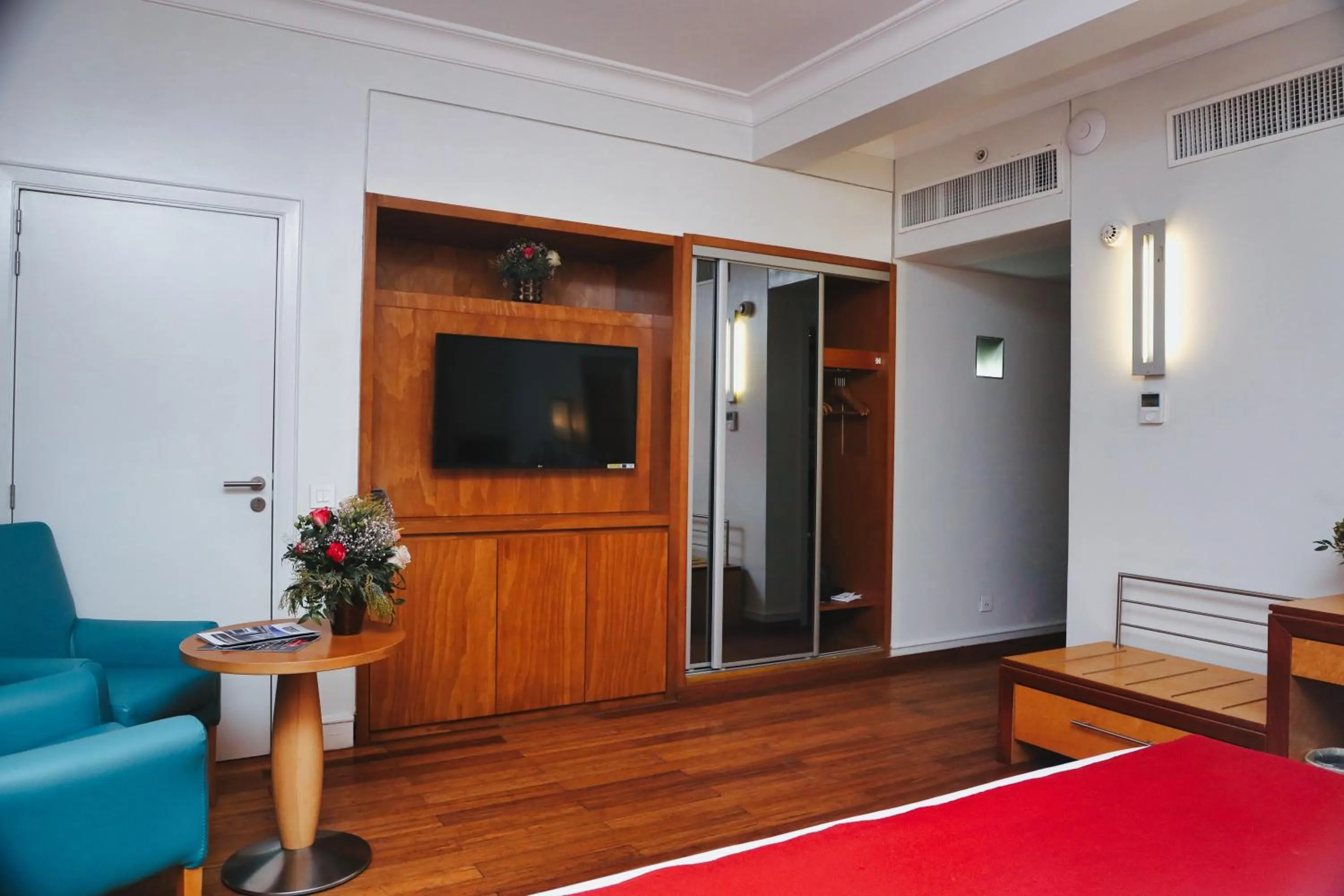 Communal lounge/ TV room in Eko Hotel Suites