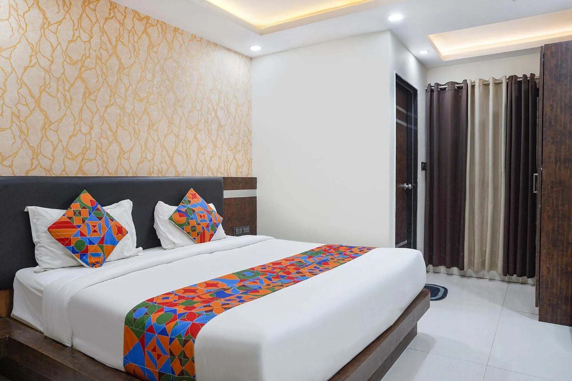 Bed in FabHotel Jalsa DLX