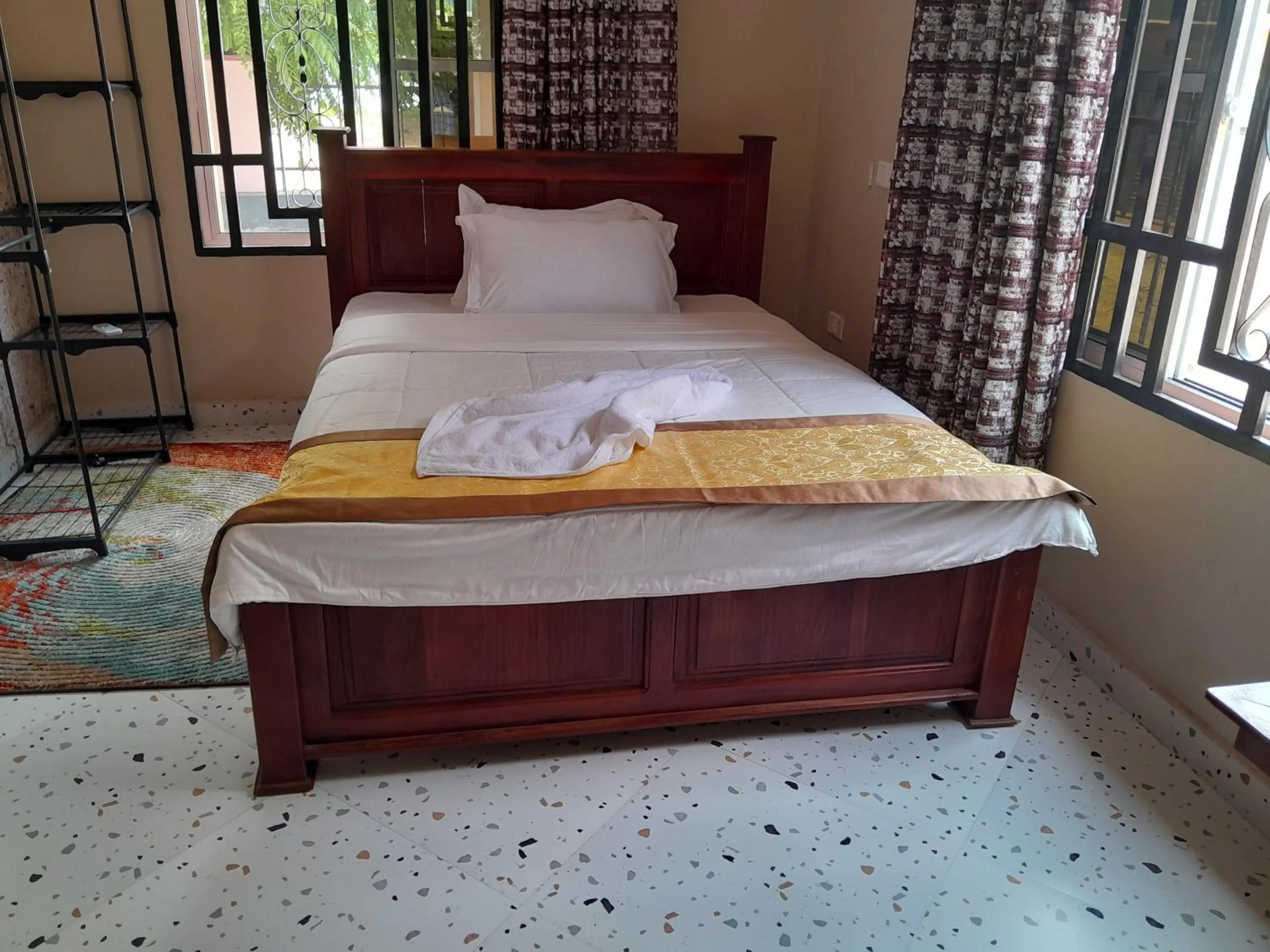 Bed in PALAZZO GARDEN RESORT MATEMA