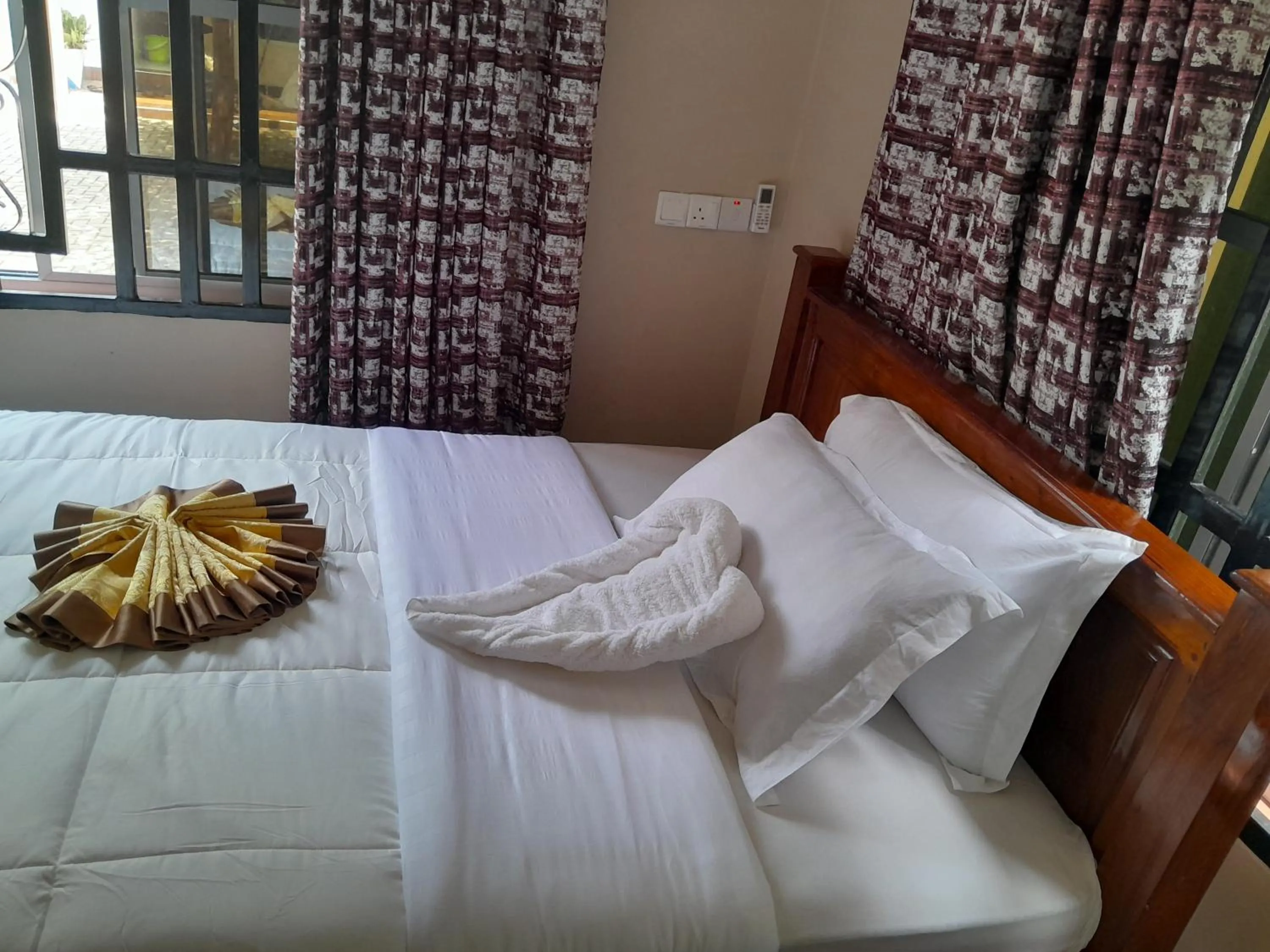 Bed in PALAZZO GARDEN RESORT MATEMA