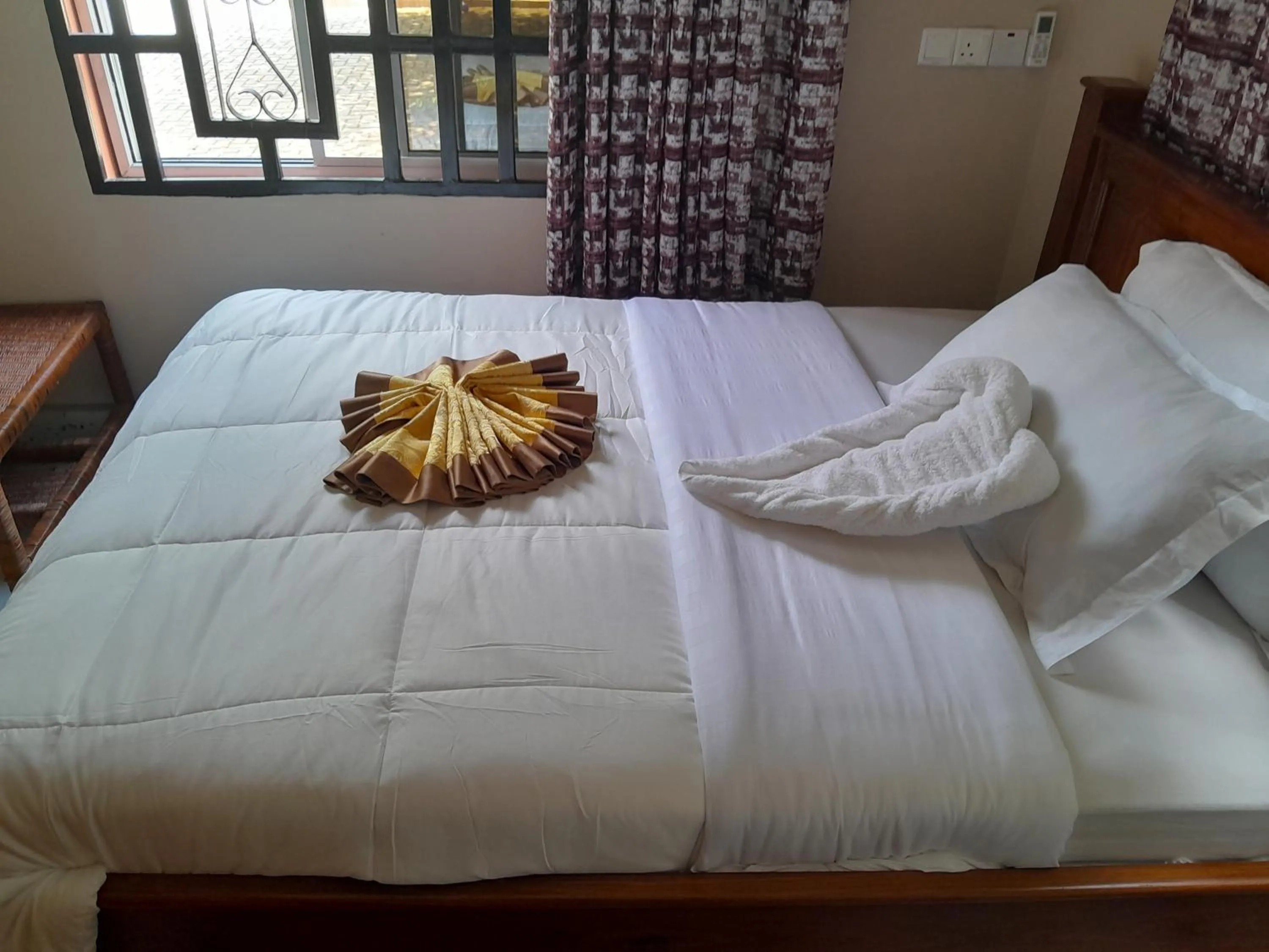 Bed in PALAZZO GARDEN RESORT MATEMA