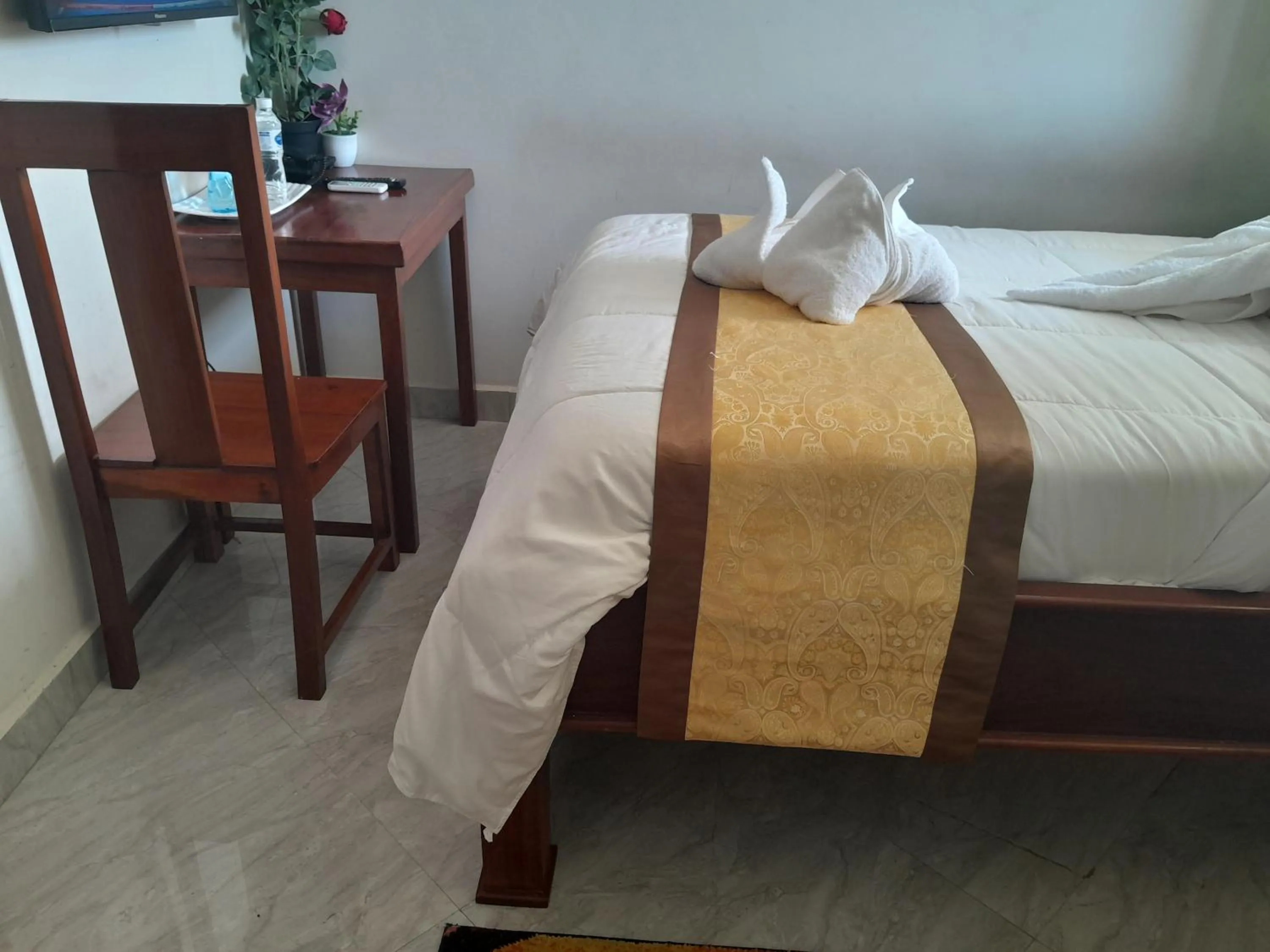 Bed in PALAZZO GARDEN RESORT MATEMA