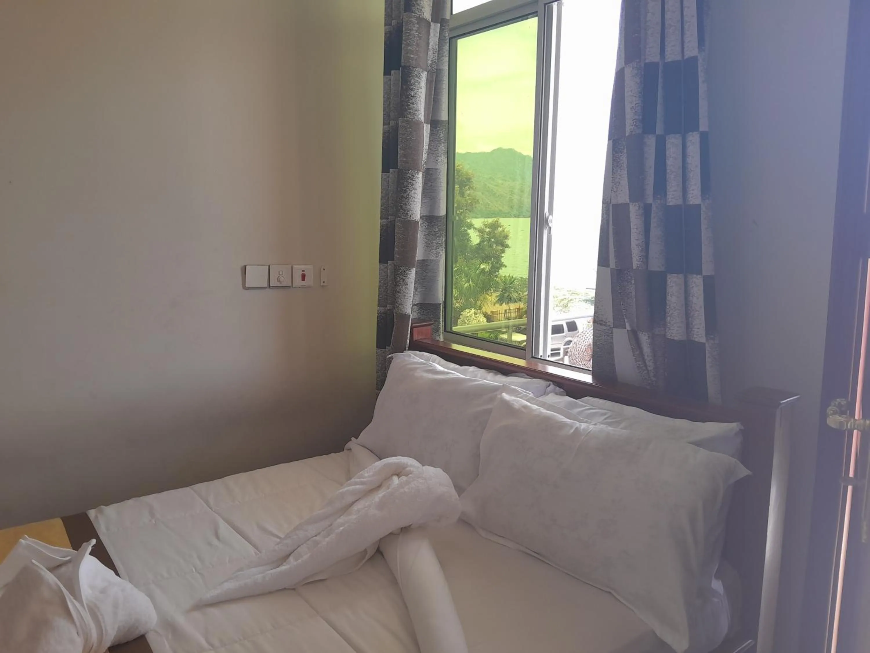 Bed in PALAZZO GARDEN RESORT MATEMA